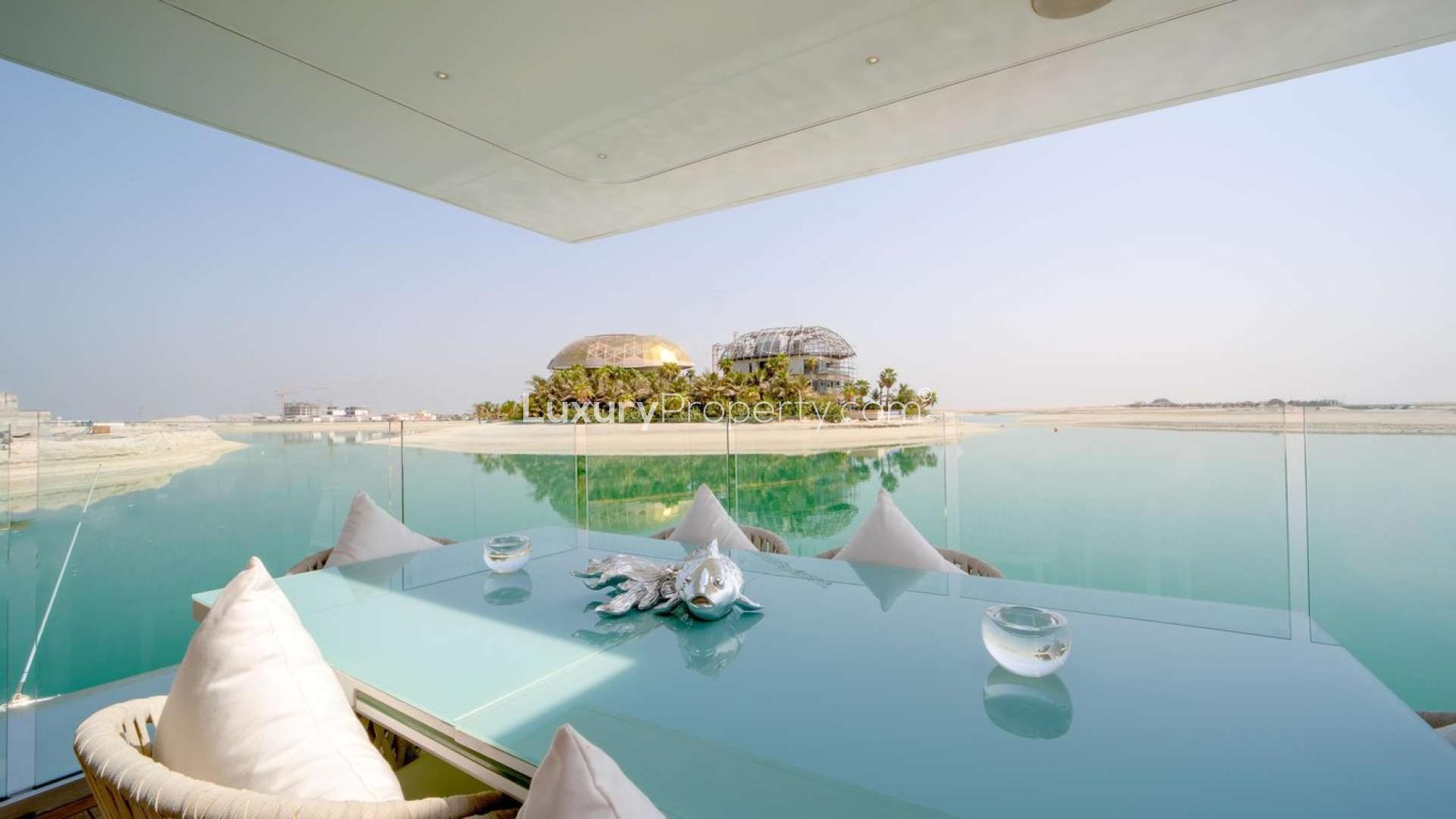 Luxury Floating Seahorse Villa terrace view over tranquil waters, The World Islands, Dubai