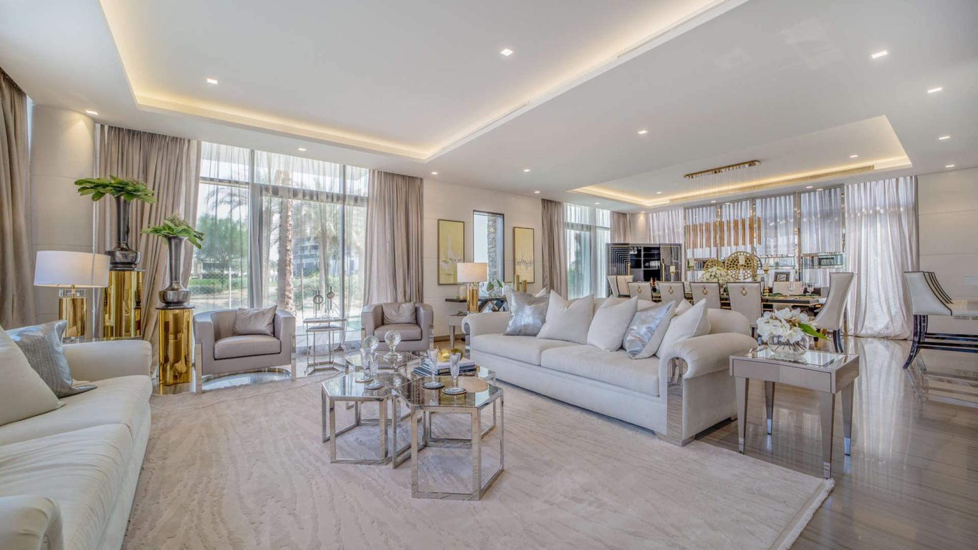Luxurious living room in Damac Hills villa with elegant decor and modern furnishings