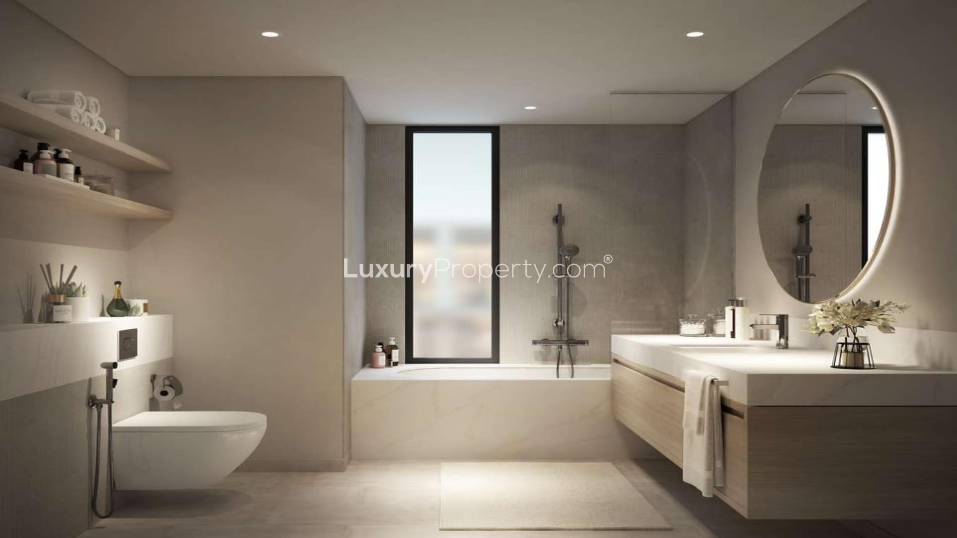 Aerial view of Nara at The Valley townhouses with lush landscaping and central pool