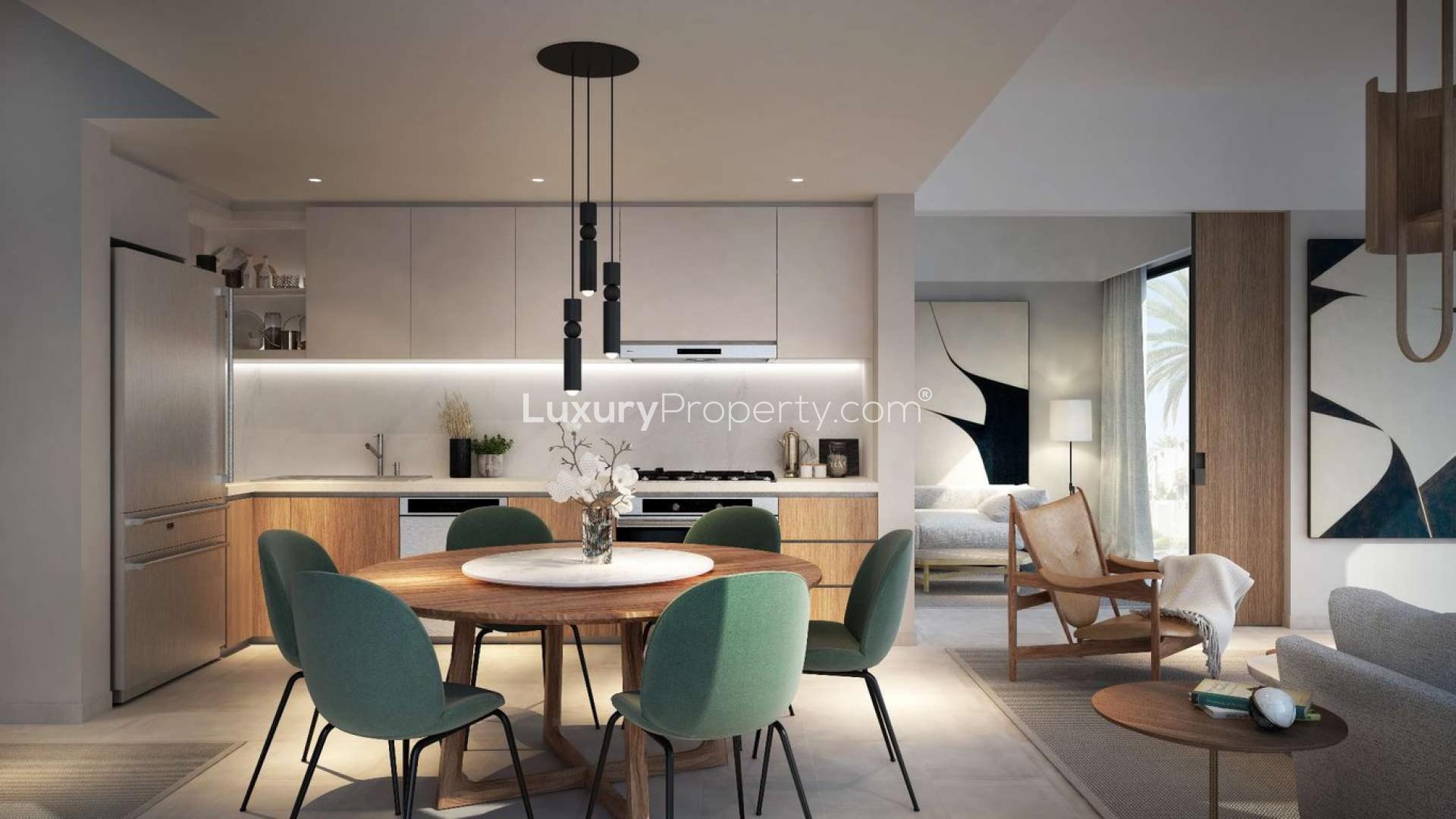 Family-friendly park at Nara, The Valley by Emaar, featuring lush greenery and play area