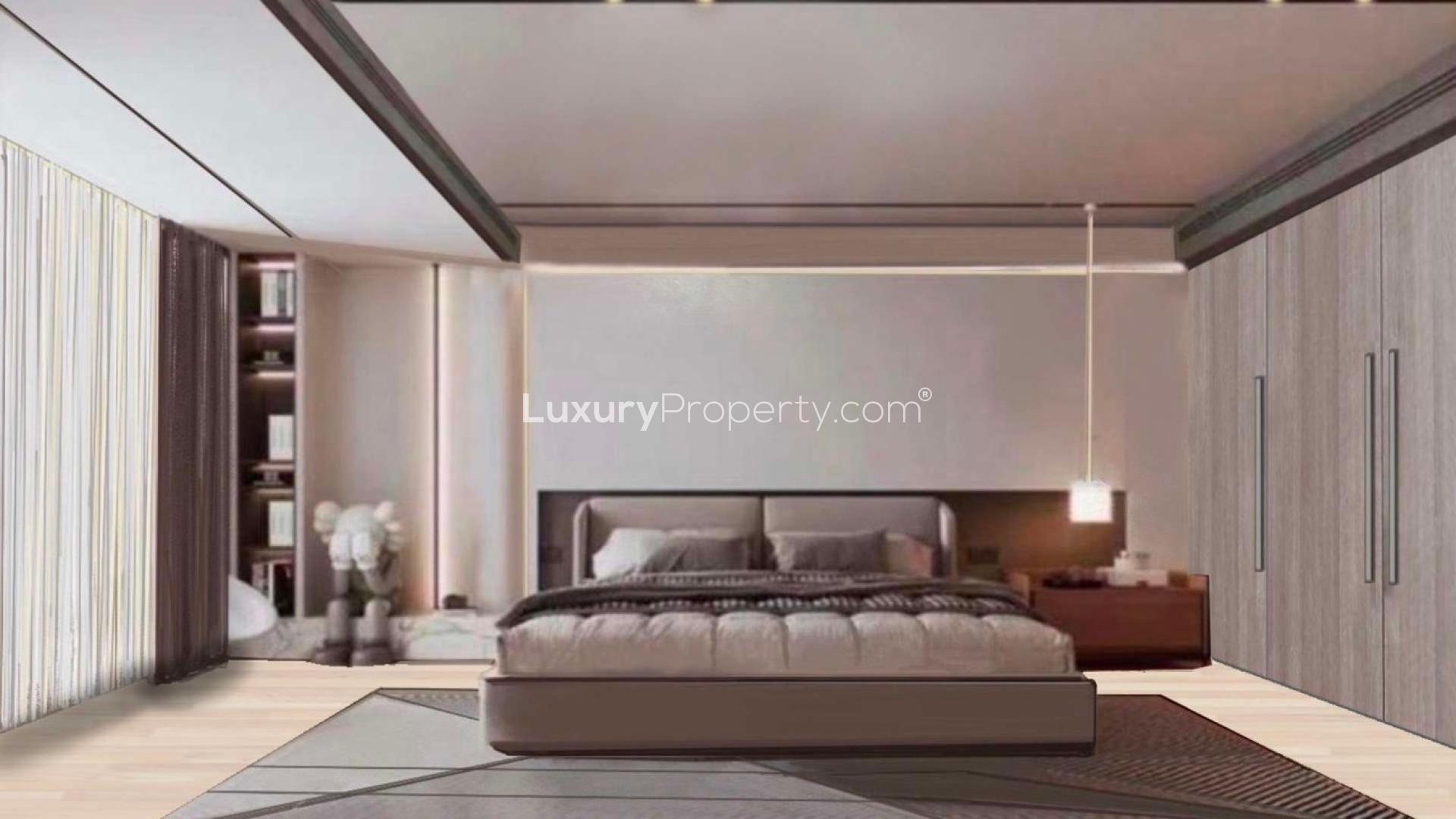 Modern Ixora Villas in Al Barari, Dubai, featuring contemporary architecture and lush greenery