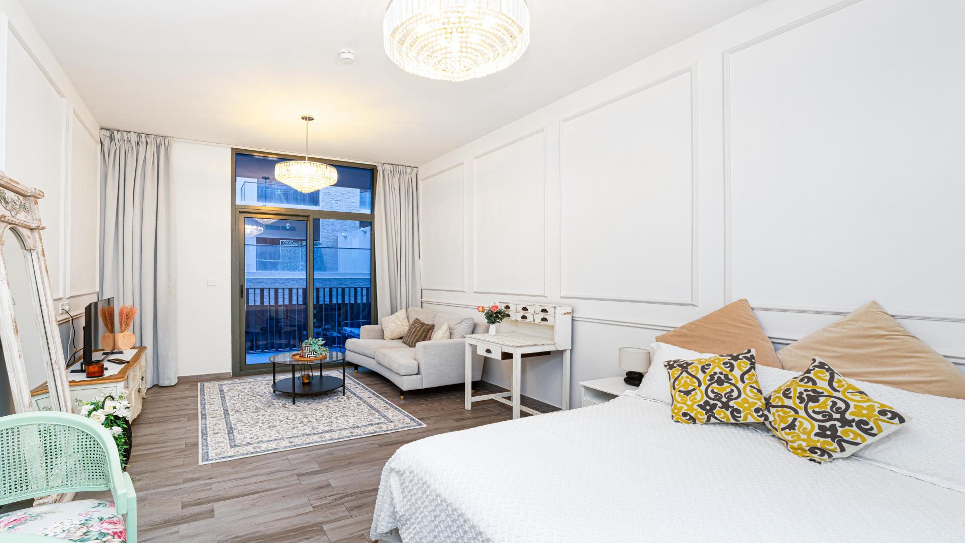 Stylish living area in JVC Belgravia Square apartment for rent, featuring modern decor