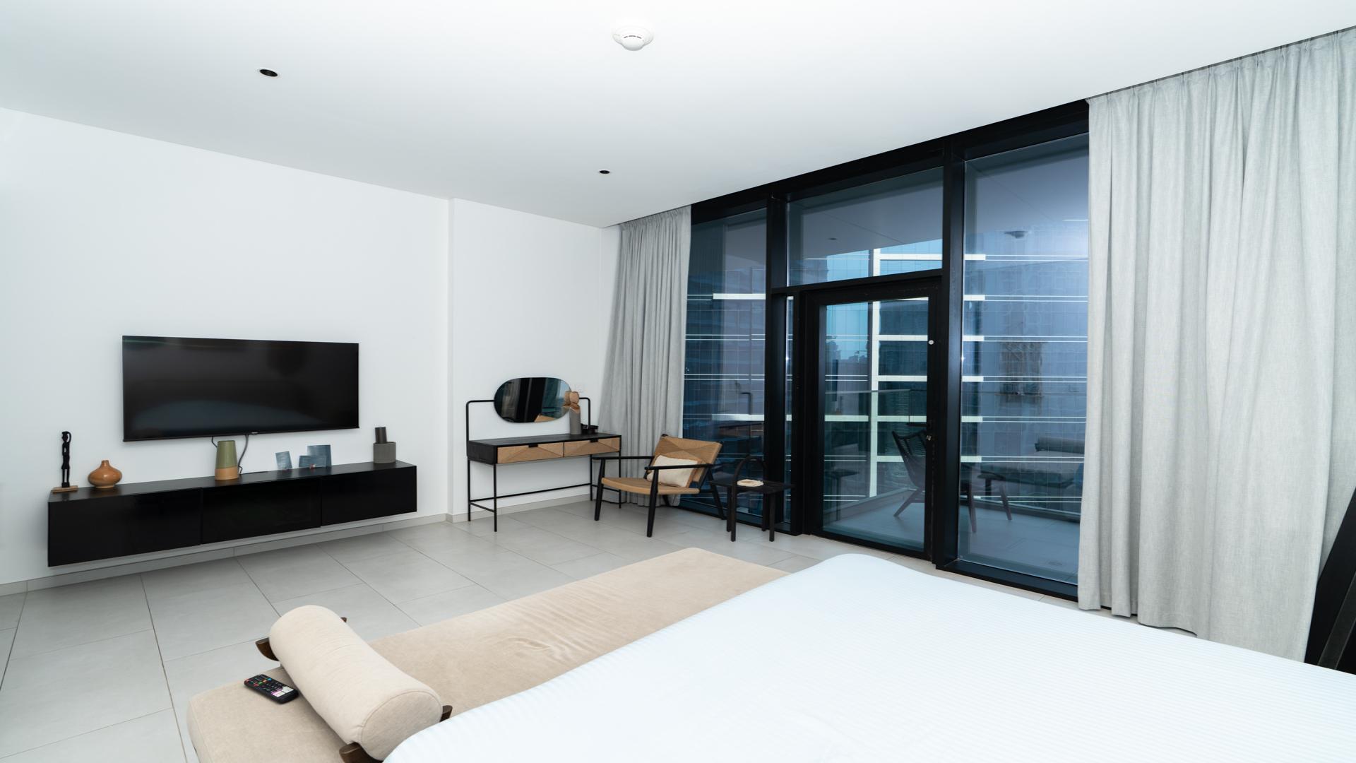 "Studio balcony with canal views, Marquise Square Tower, Business Bay, apartment for rent.",Fully furnished studio apartment interior with canal views in Marquise Square Tower, Business Bay