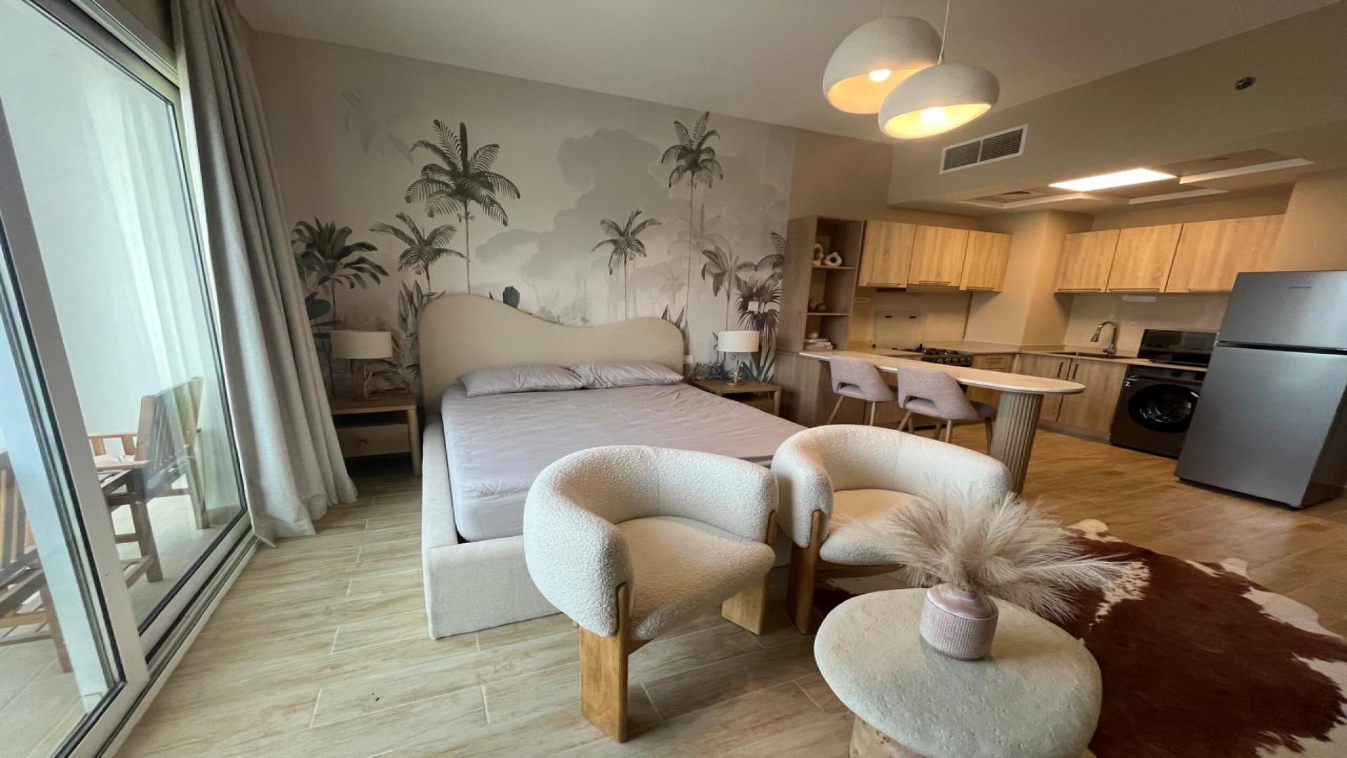 Modern kitchen in fully upgraded studio apartment, AG Tower, Business Bay, Dubai