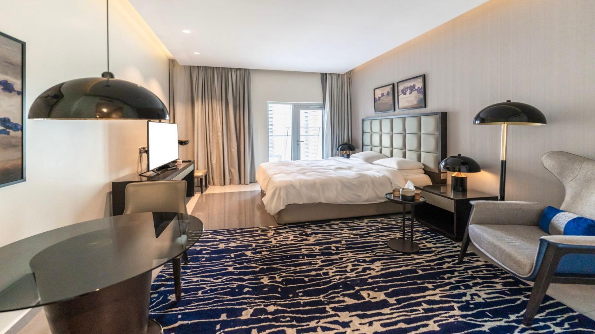 High-floor studio apartment interior in DAMAC Majestine, Business Bay, available for rent