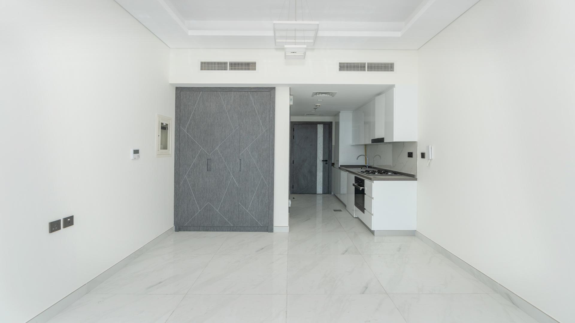 Brand new studio apartment kitchen with modern finishes in Arjan, Samana Park Views