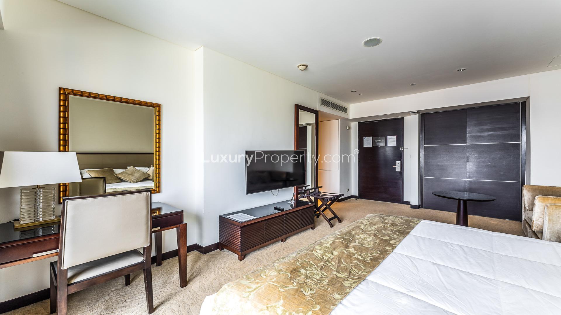 Modern studio apartment interior, Dubai Marina view from JW Marriott Hotel Marina