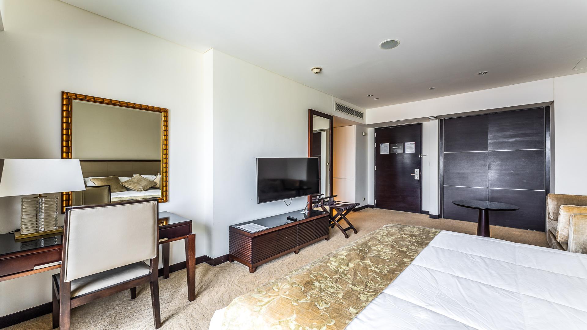 Modern studio apartment interior, Dubai Marina view from JW Marriott Hotel Marina