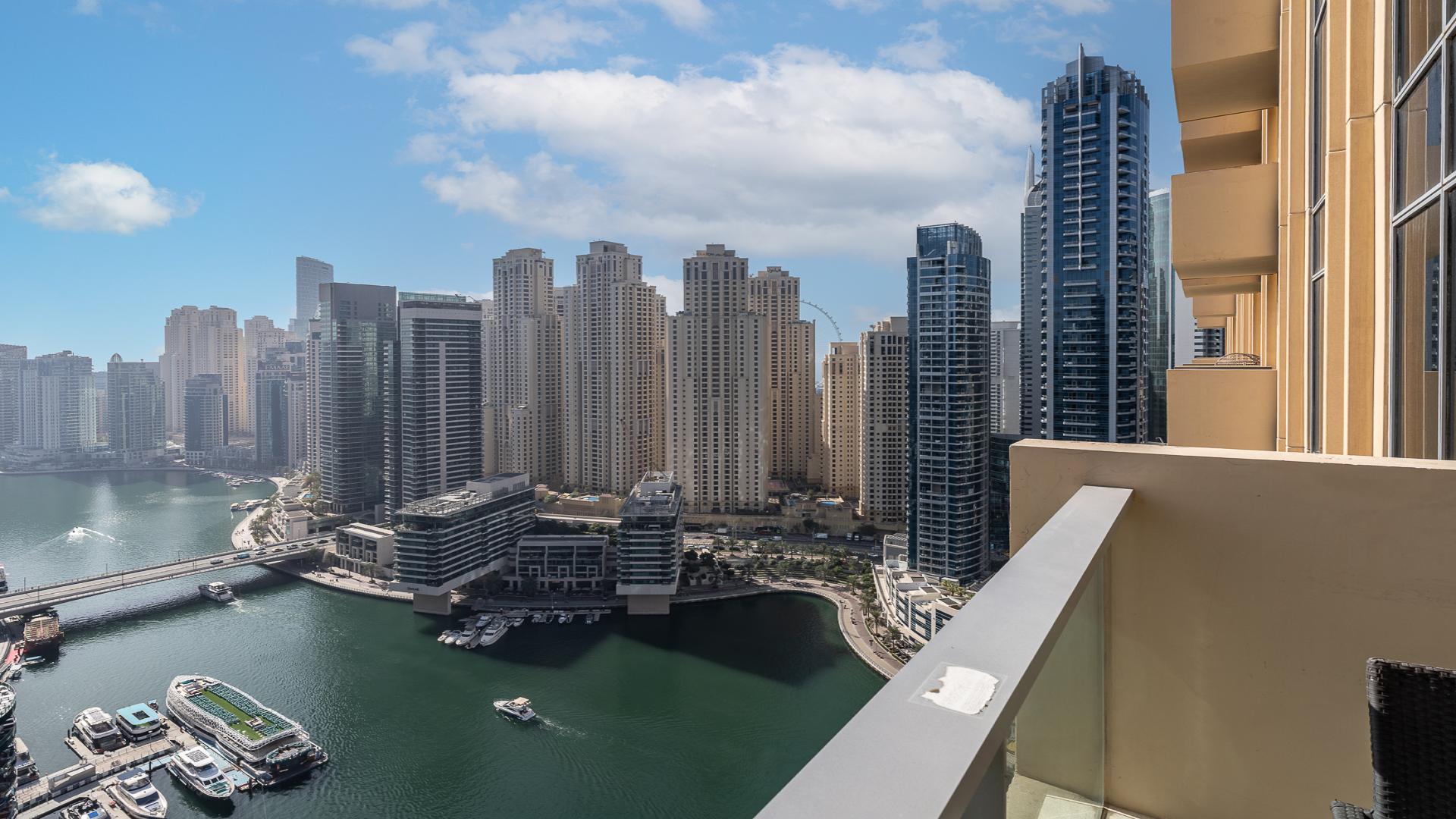 Luxurious studio apartment interior with balcony view at JW Marriott, Dubai Marina