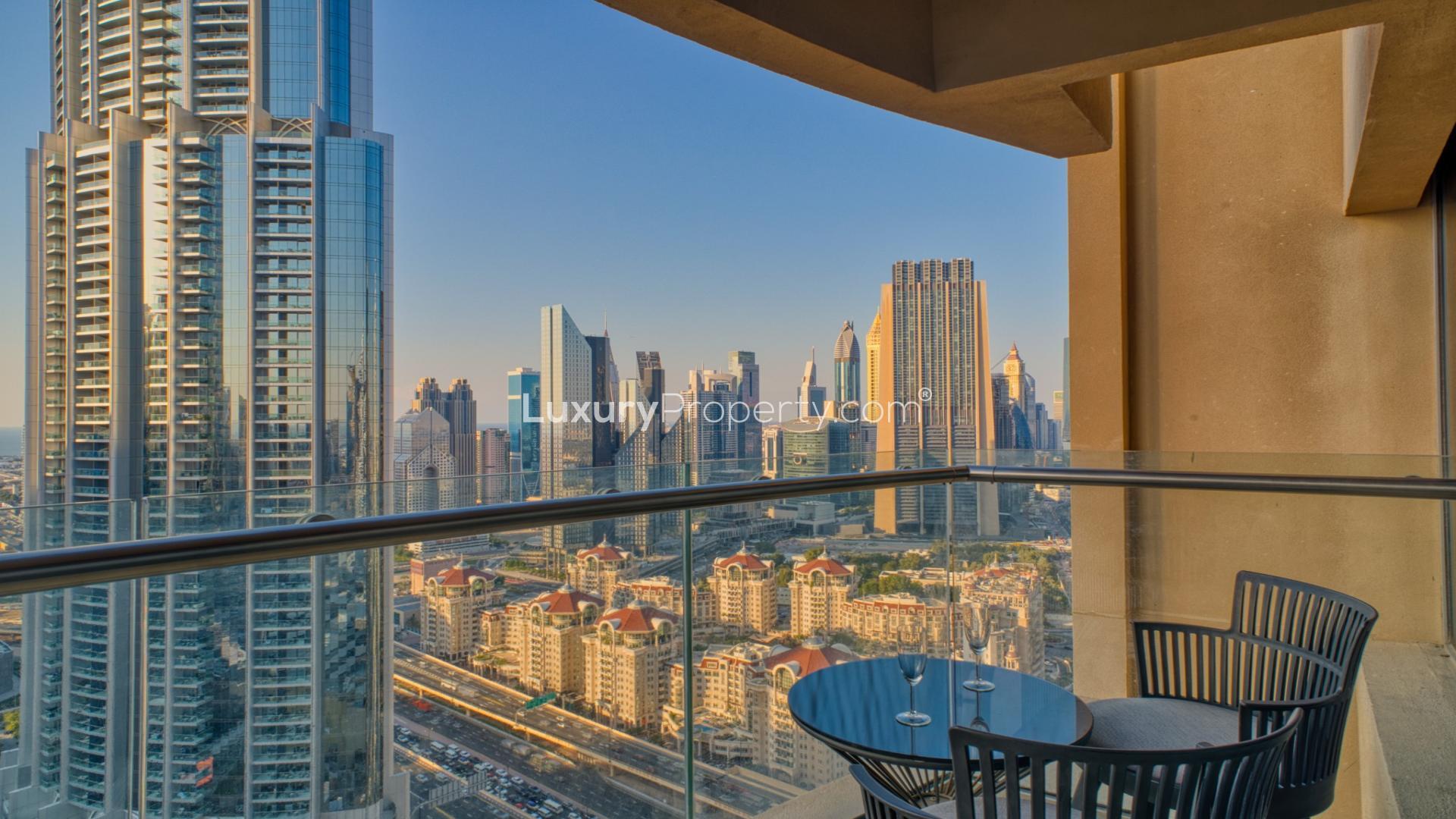 Balcony view of city skyline from Kempinski Central Avenue apartment for sale