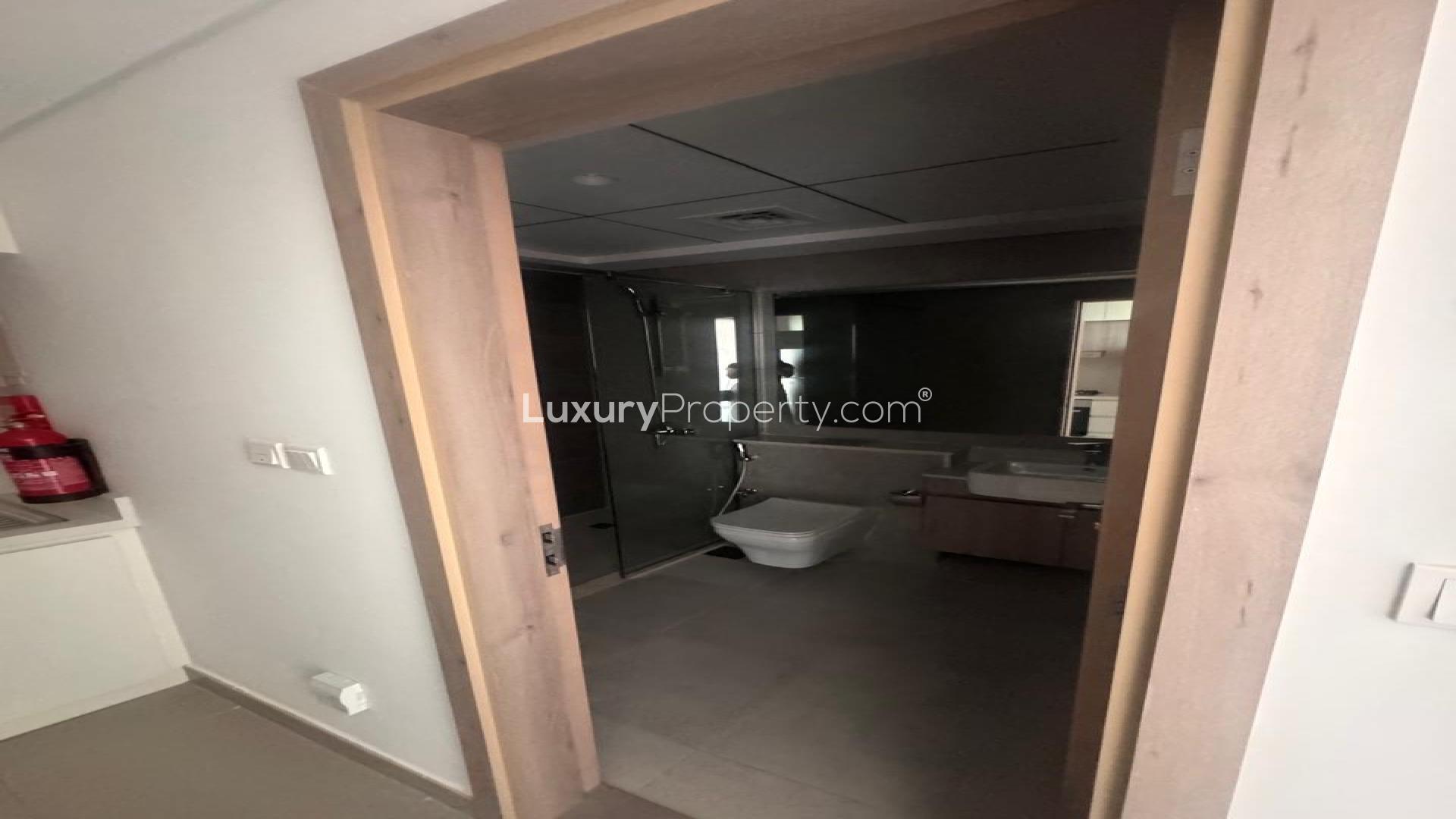 Laundry area with washing machine in Prive Residence apartment, Dubai Hills Estate