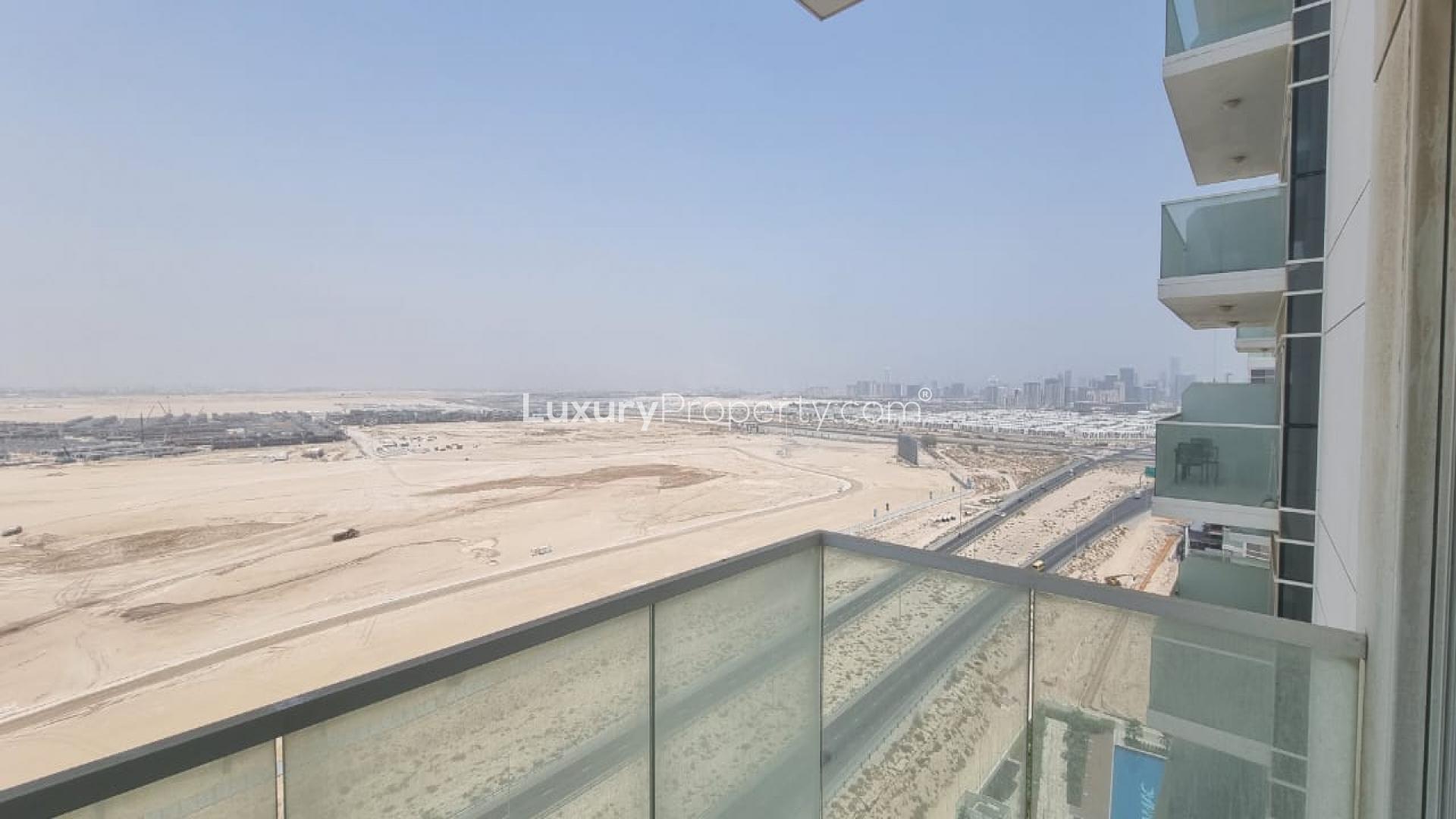 Fitness center in Artesia, Damac Hills studio apartment for sale, featuring modern gym equipment