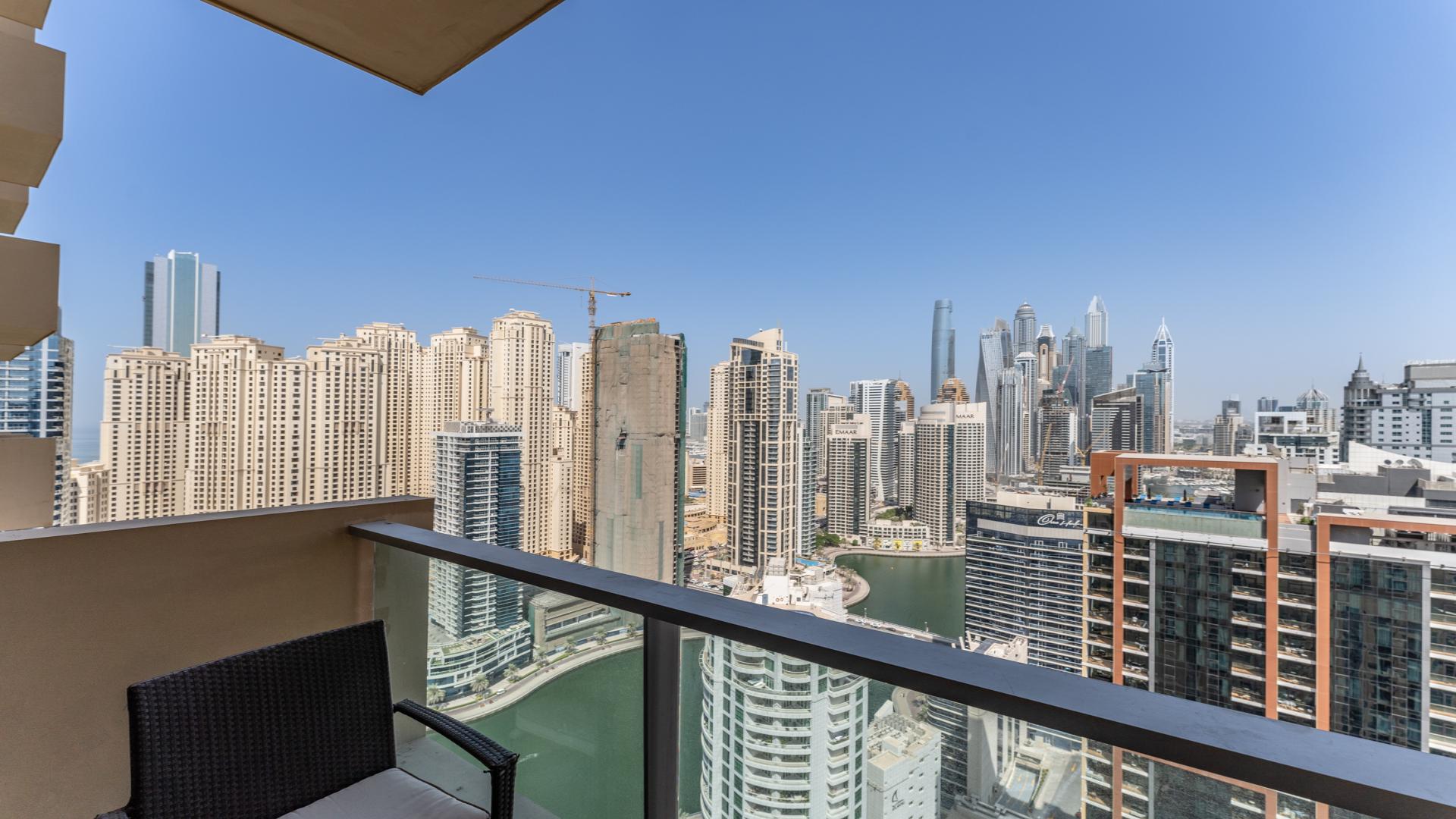 Studio apartment interior with city view, The Address Dubai Marina, for sale, high ROI