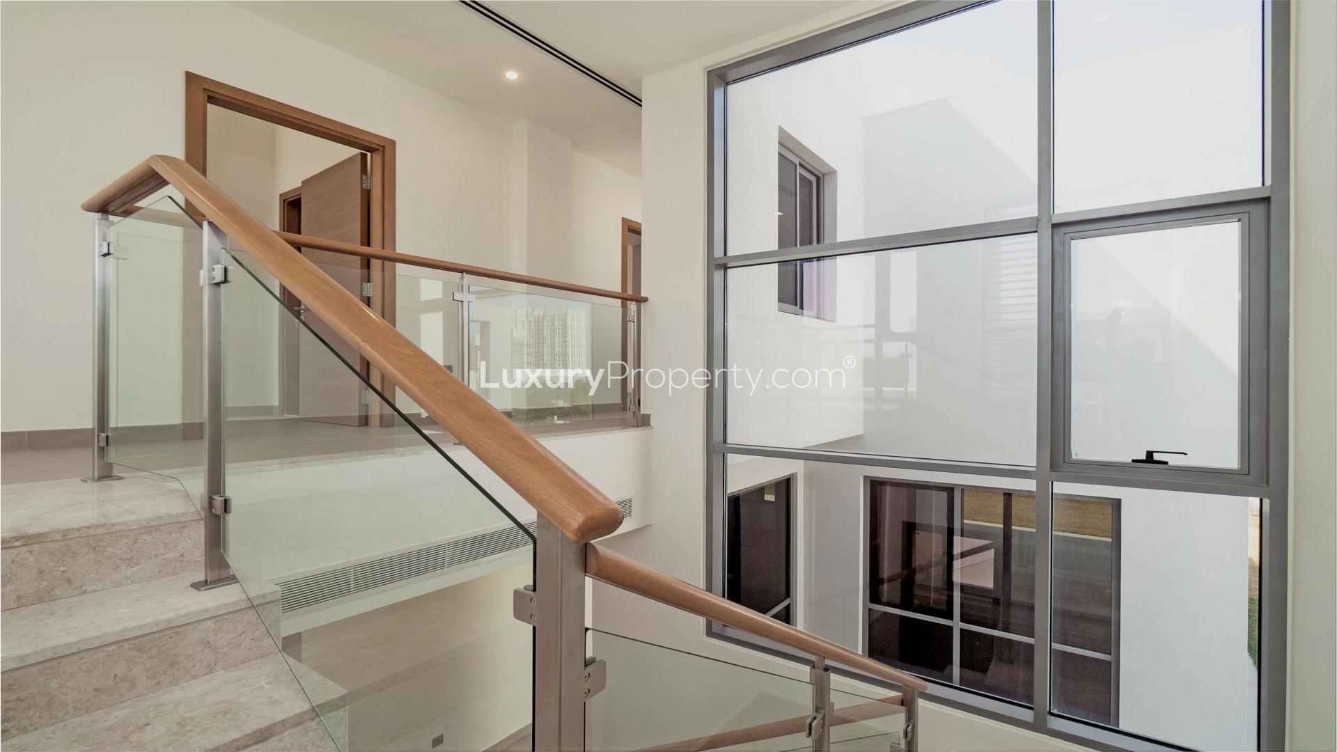 Spacious bedroom with built-in wooden closet in Sidra Villas, Dubai Hills Estate