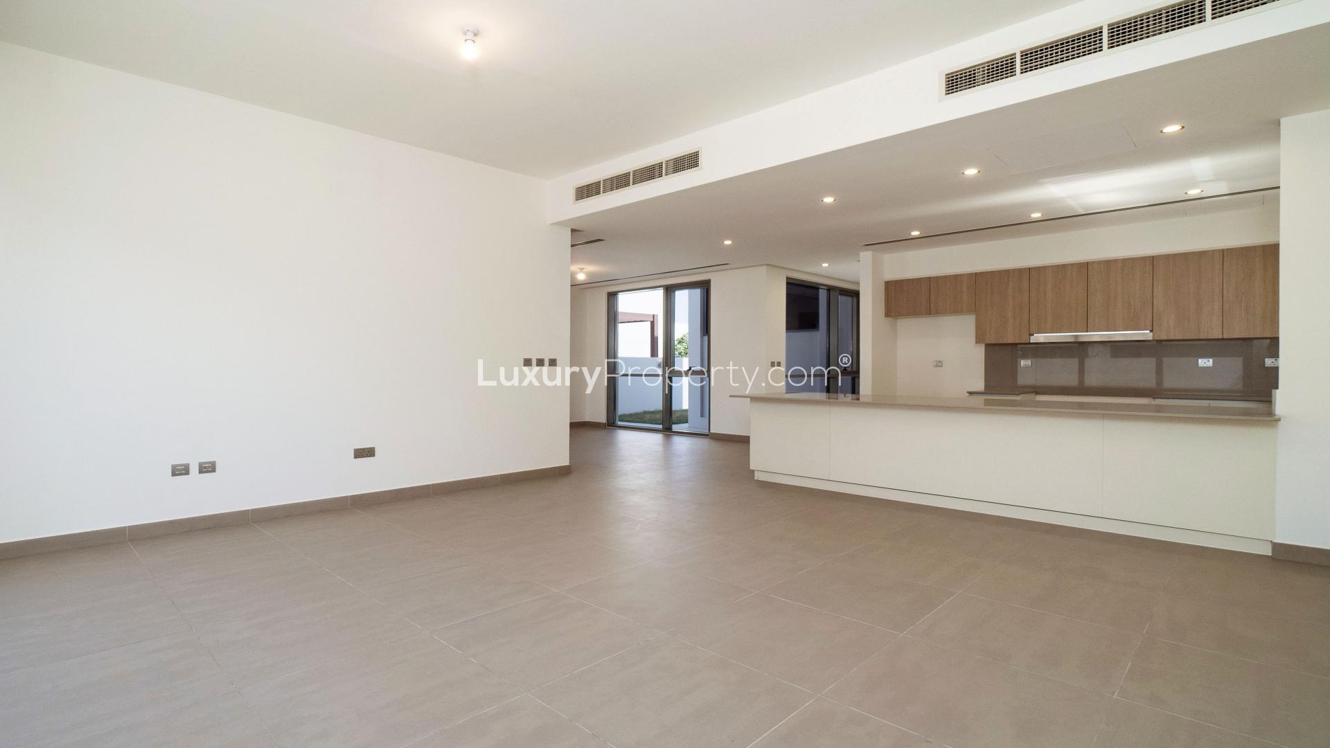 Modern staircase with glass railing in Sidra Villas, Dubai Hills Estate, elegant design features