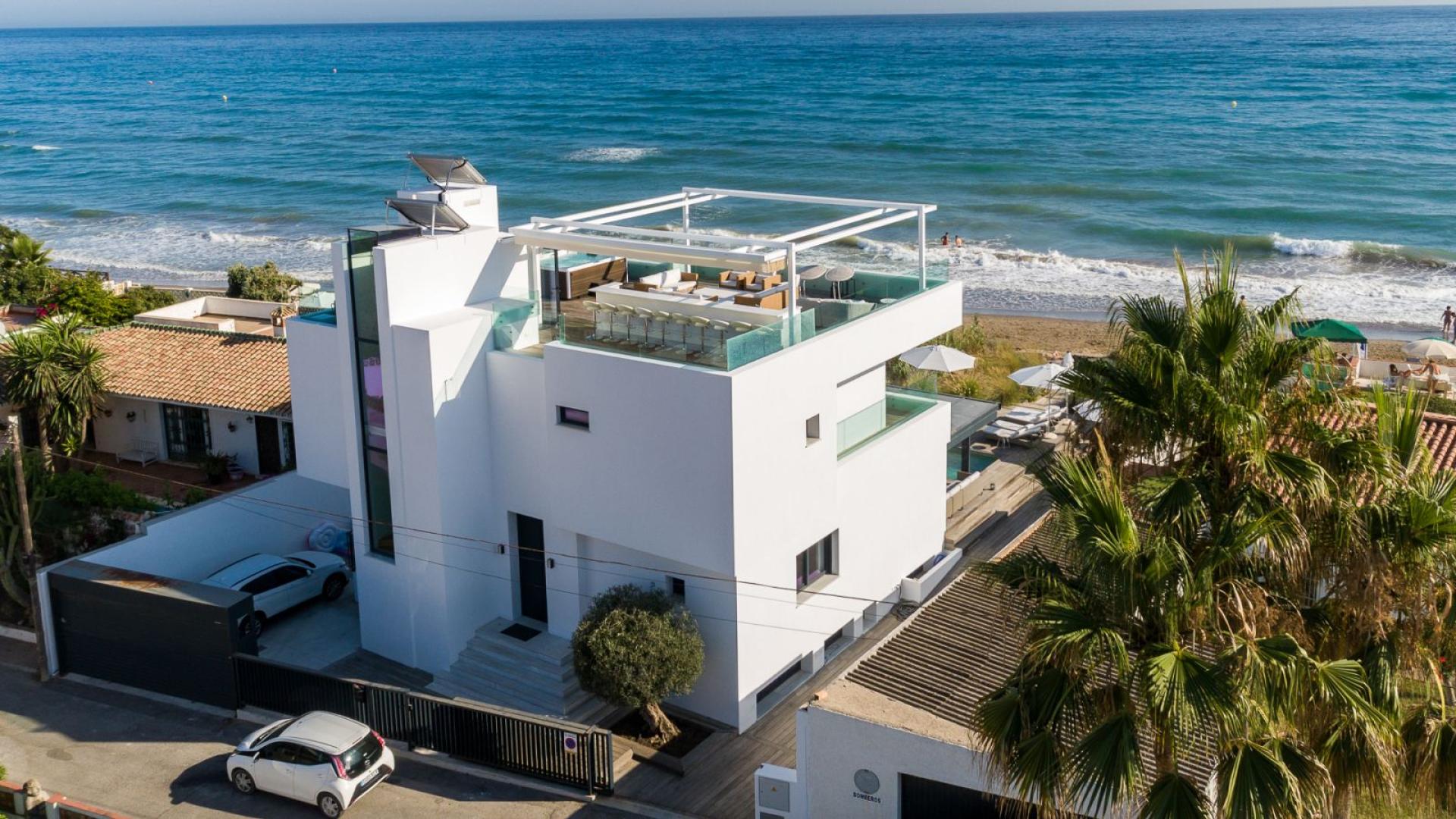 Champagne on ice with ocean view at Costabella villa, Marbella, for sale