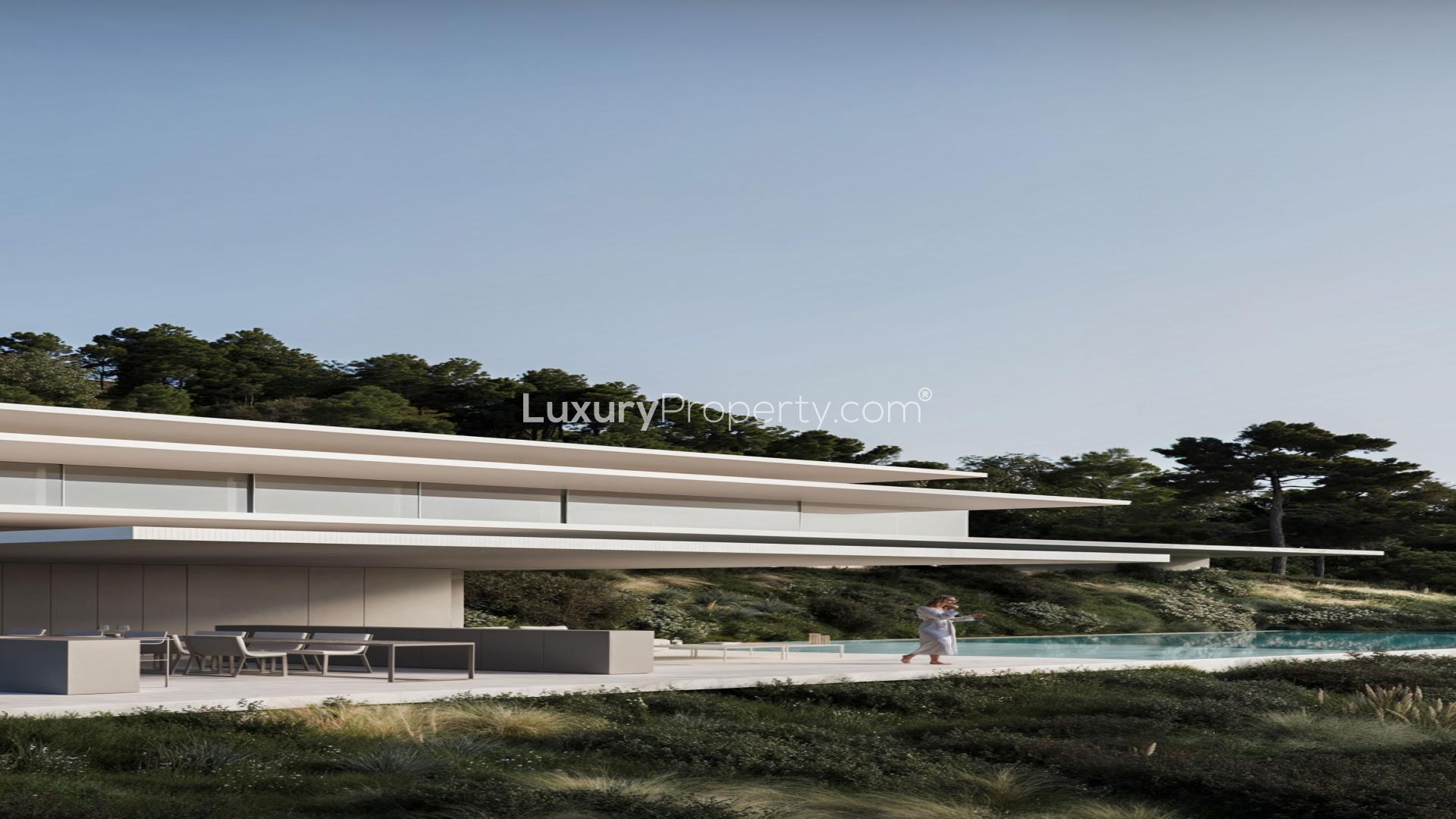 Modern La Reserva Sotogrande villa with spacious outdoor seating and scenic views