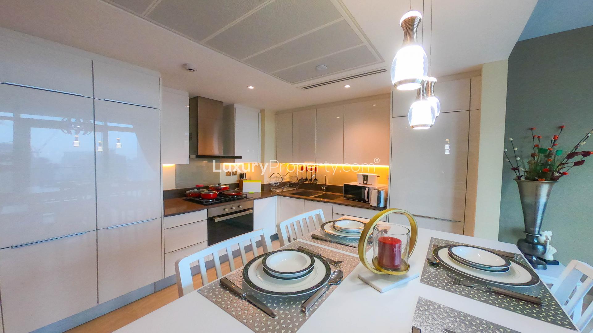 Furnished living and dining area in Marina Gate apartment, Dubai Marina, with city view