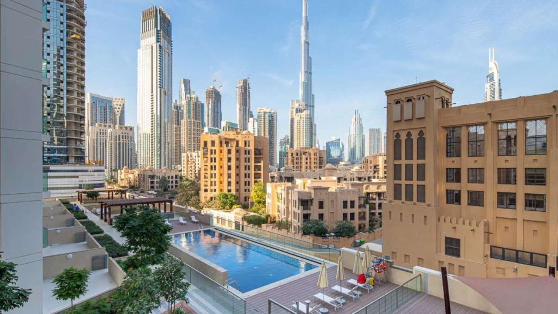 Modern furnished living and dining area in Bellevue Towers apartment, Downtown Dubai