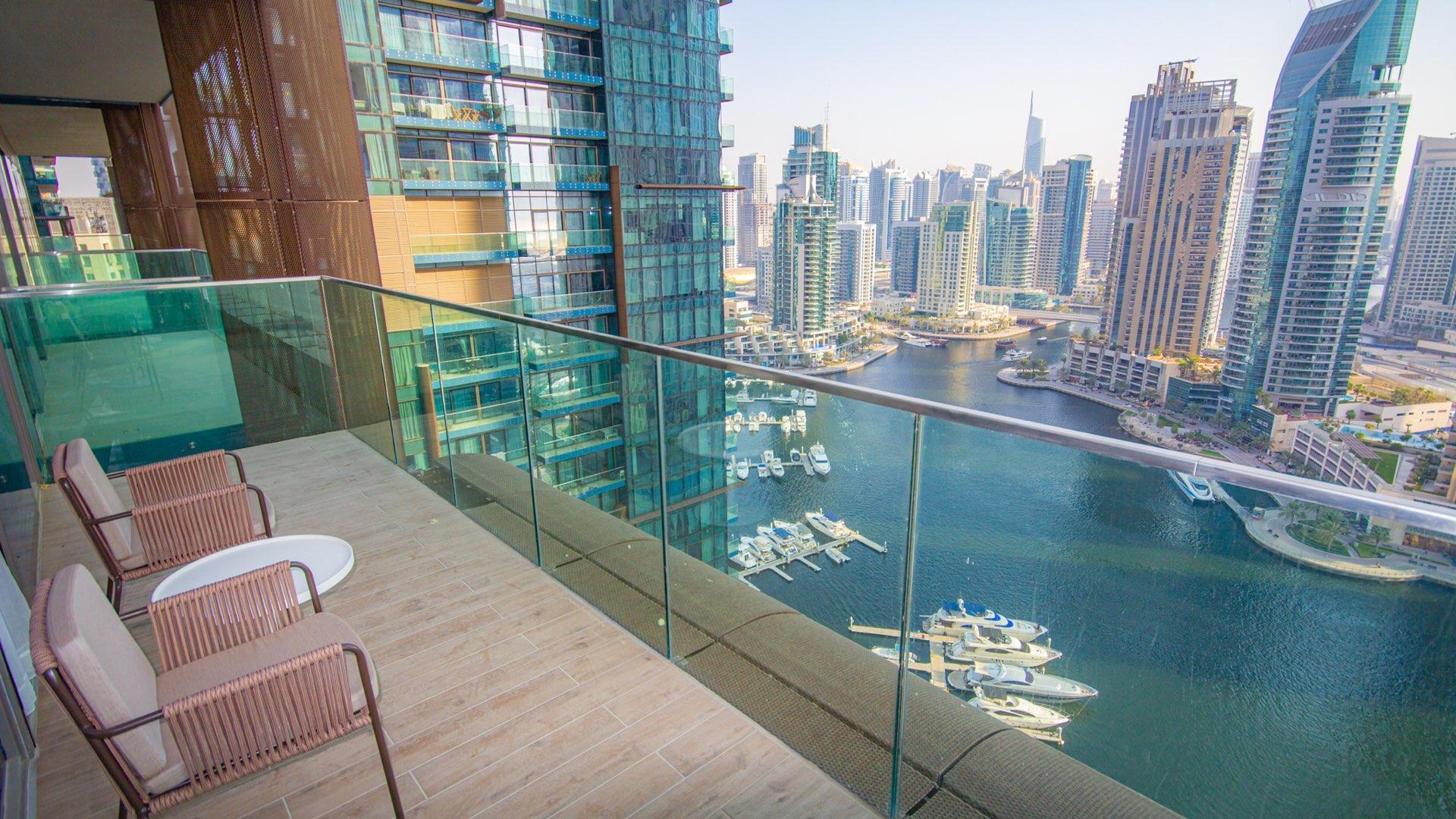 Modern bedroom interior in Marina Gate apartment, Dubai Marina, featuring stylish decor and cozy ambiance