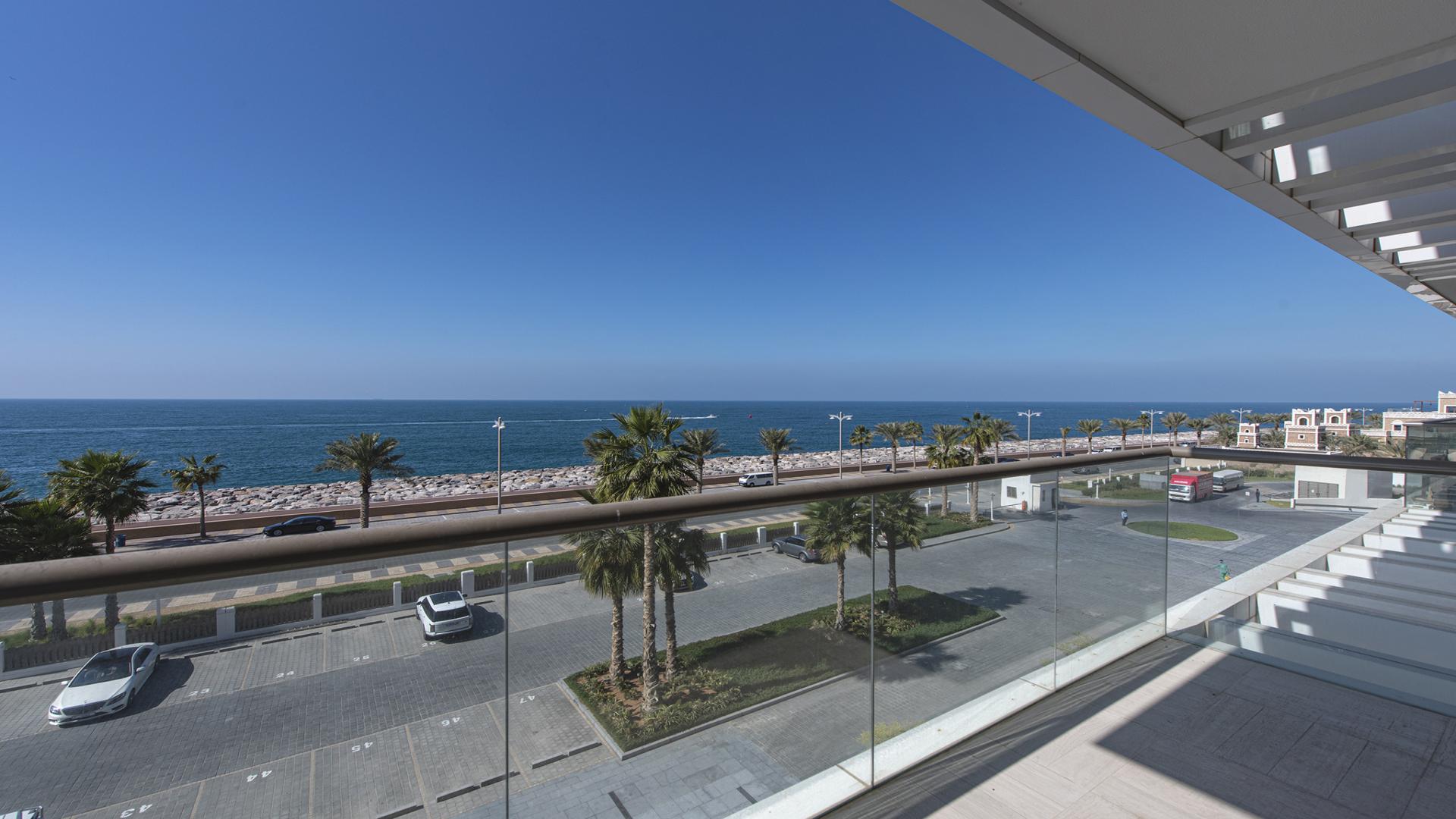 Modern living room in vacant one-bedroom apartment, The Crescent, Palm Jumeirah, for sale