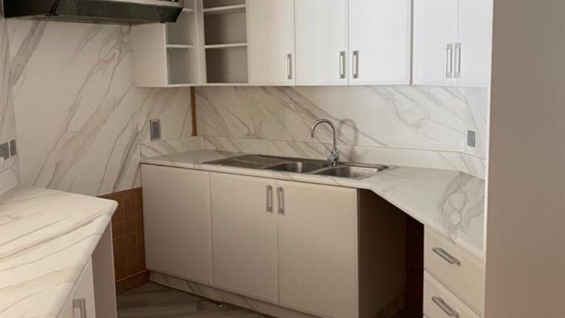 "Balcony view of sea from 1-bedroom apartment in Shoreline, Palm Jumeirah.",Upgraded kitchen in 1-bedroom apartment, Shoreline Apartments, Palm Jumeirah, marble countertops, modern design