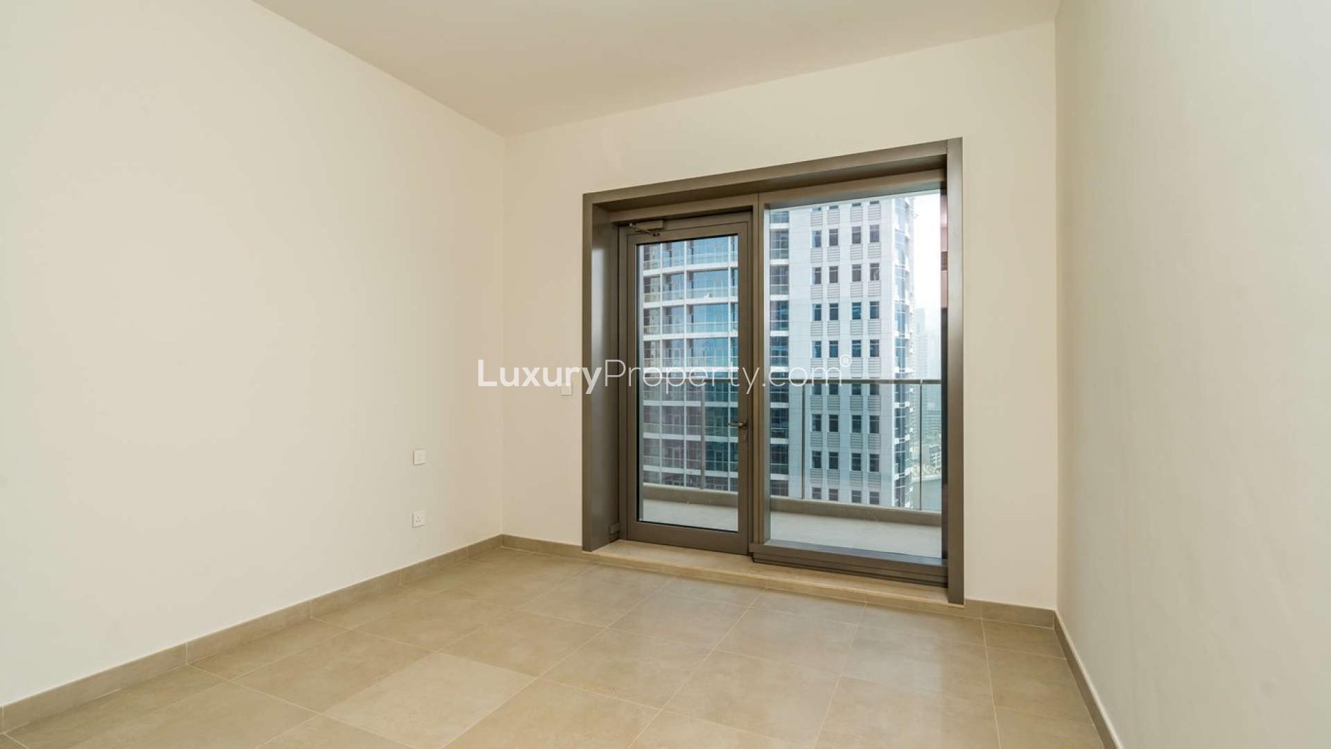 Dubai Marina view from Sparkle Towers apartment, featuring waterfront and skyline in the distance