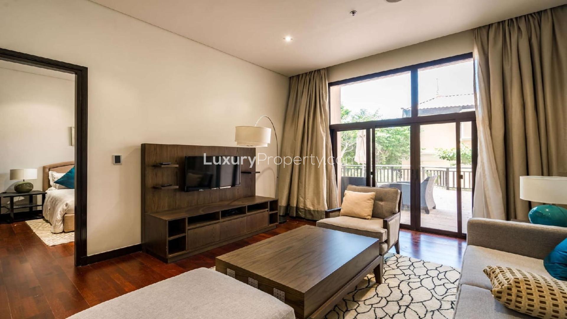 Ground floor terrace with seating, Anantara Residences, Palm Jumeirah, Burj Al Arab view apartment