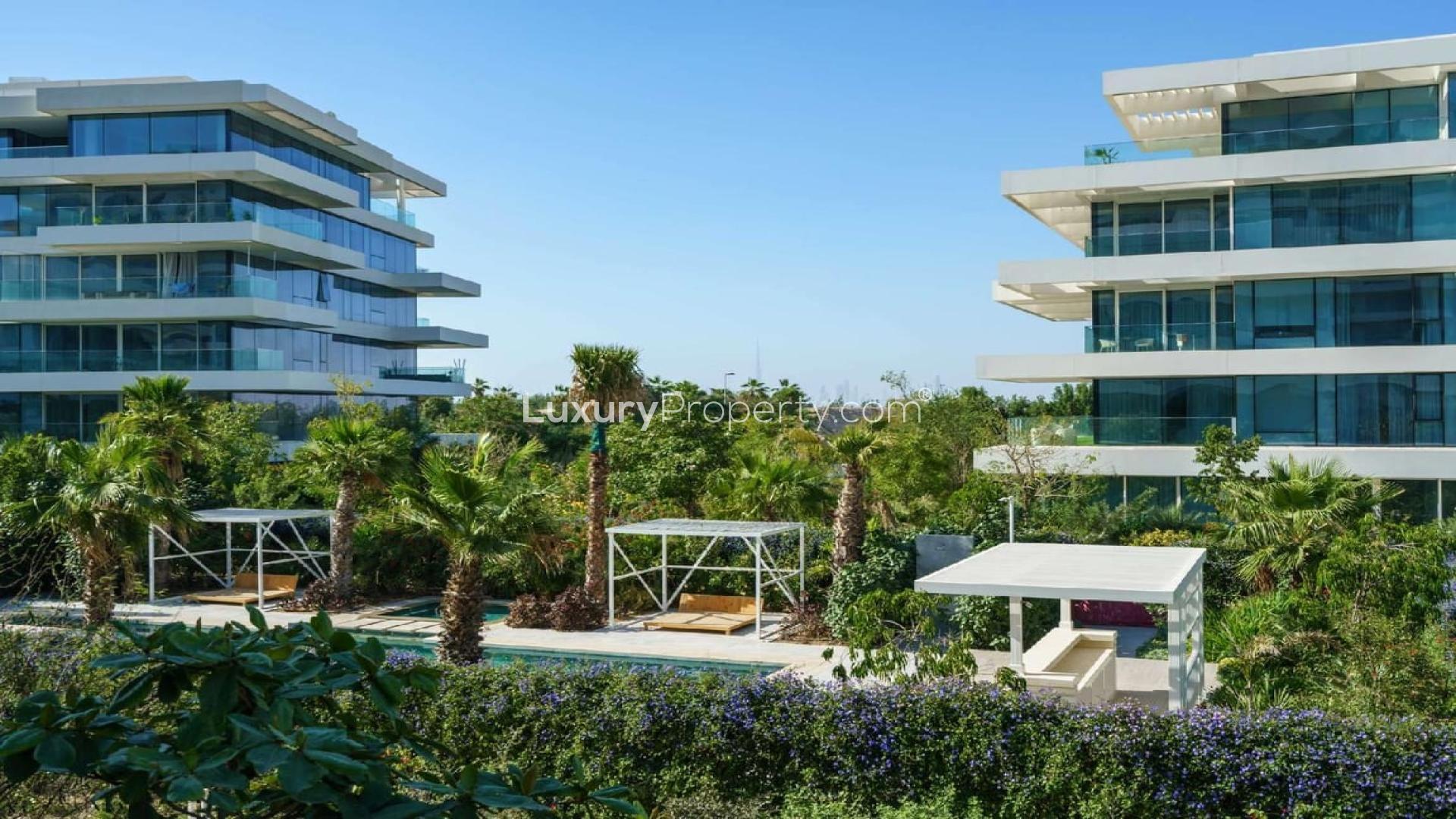 Modern kitchen in 1-bedroom apartment for rent, Ashjar, Al Barari, with sleek design