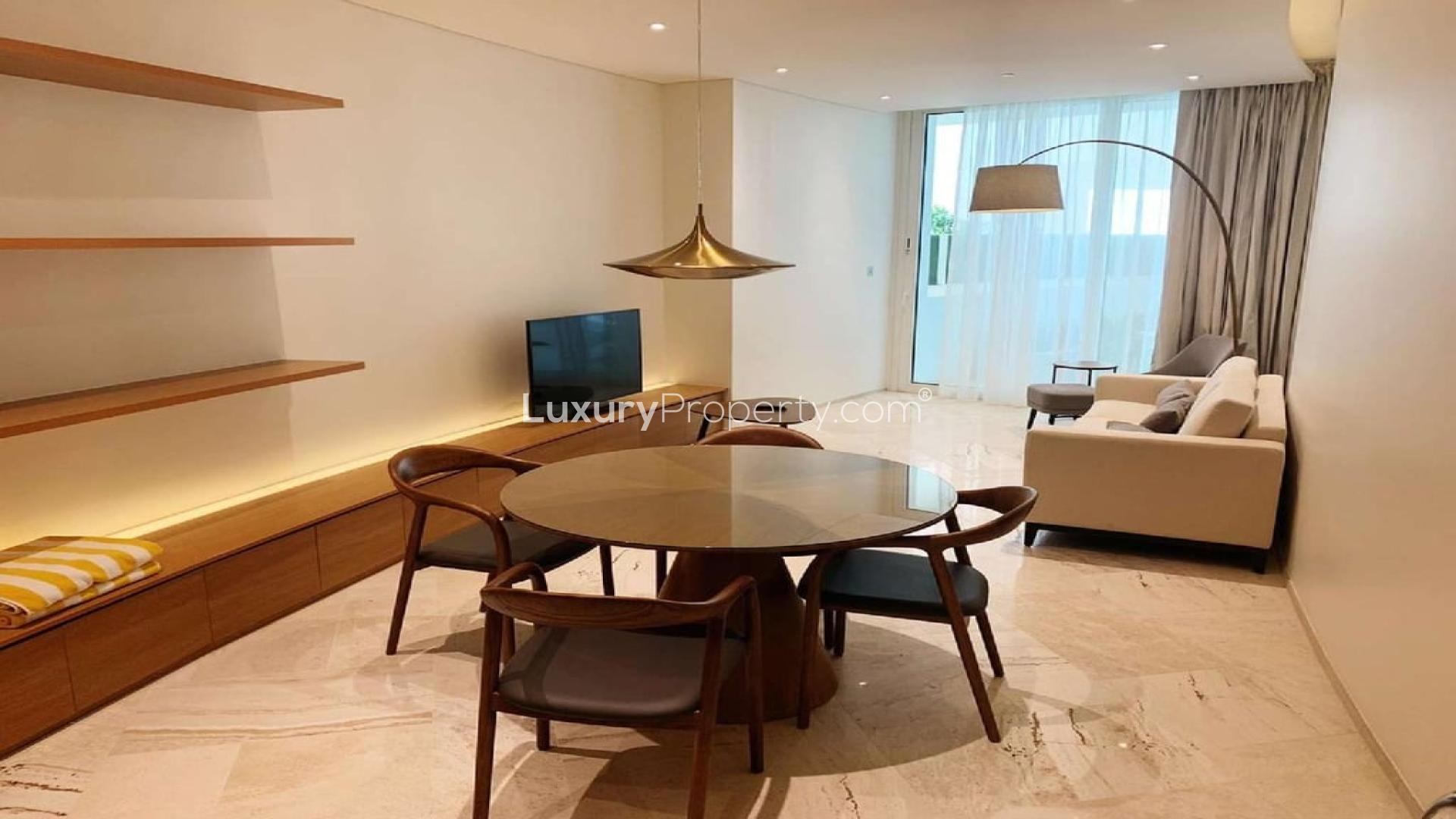 "Bright, modern living room in fully furnished 1-bed apartment at The Five Hotel, JVC.","Modern furnished living room in 1-bed apartment, Five Hotel, JVC, open layout, stylish decor.",Fully furnished living area in 1-bed apartment, Five Hotel, Jumeirah Village Circle