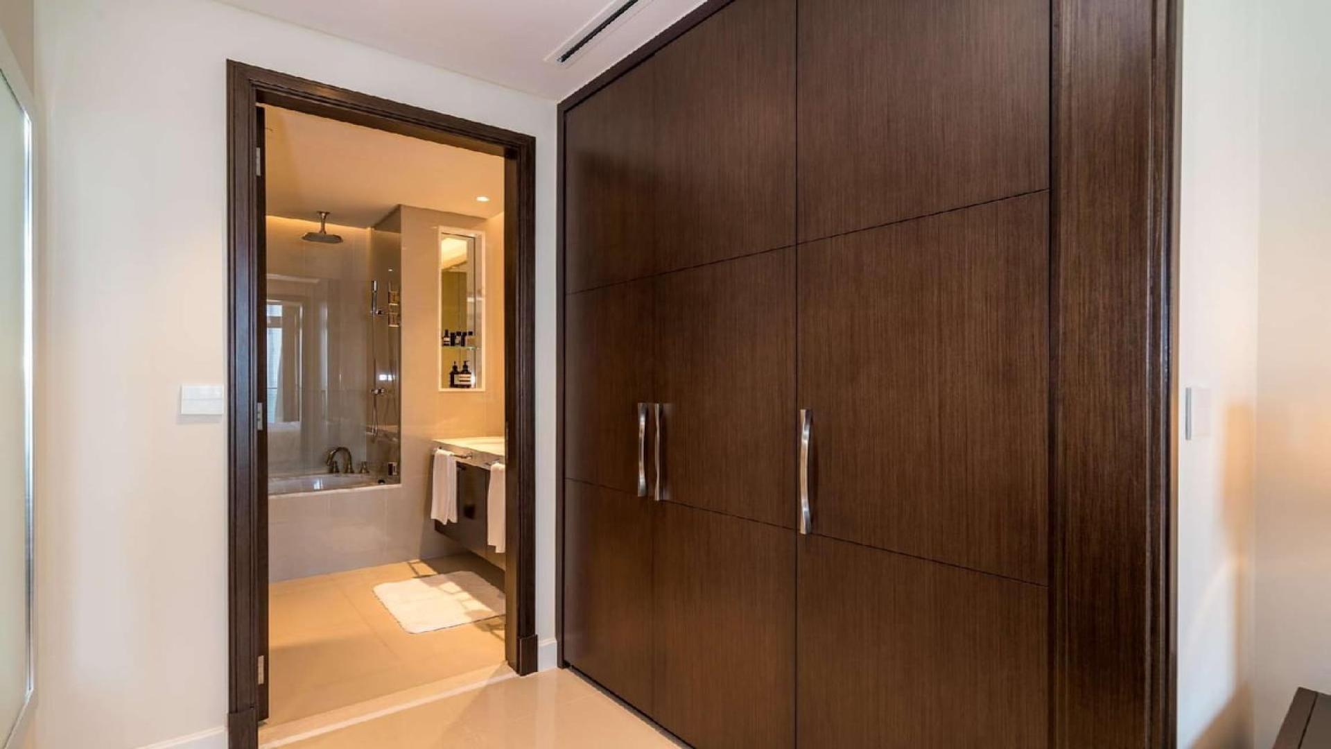 Luxurious bathroom with wooden closet in 1-bedroom apartment, The Address Fountain Views, Dubai