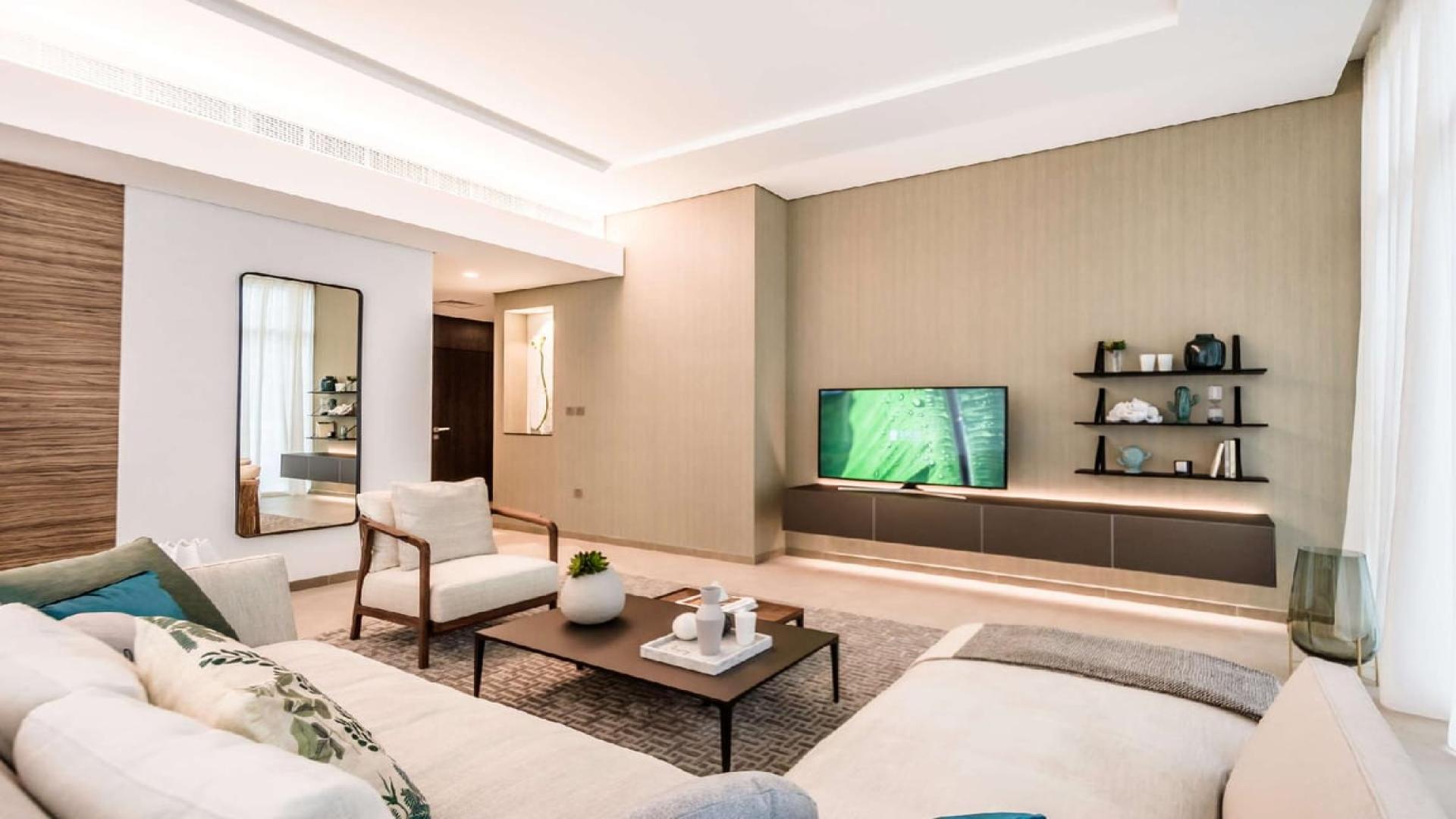 Modern living and dining area in 1-bedroom apartment at Banyan Tree Dubai, Jumeirah Lake Towers