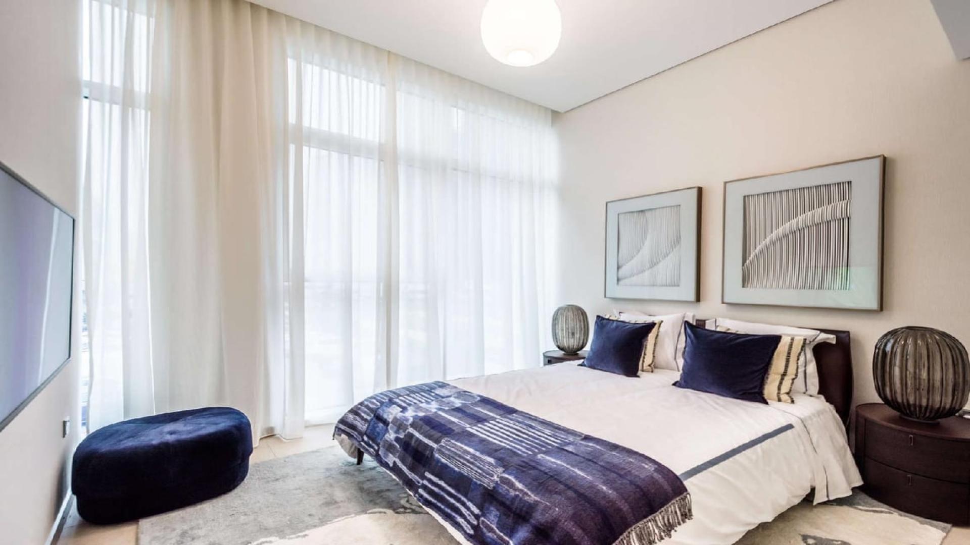 Modern dining and living area in Banyan Tree Residences, Jumeirah Lake Towers apartment for rent