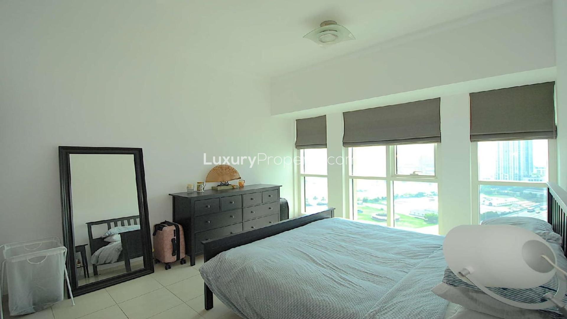 Modern kitchen and living area in one-bedroom apartment, Churchill Towers, Business Bay