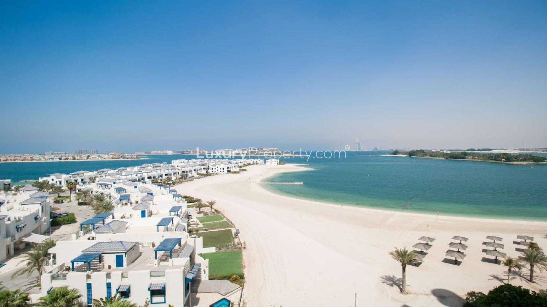 "Scenic beachfront view from 1-bedroom apartment in Al Khudrawi, Palm Jumeirah, Shoreline Residences.",Beachfront view from 1-bedroom apartment in Shoreline Residences, Palm Jumeirah, Al Khudrawi