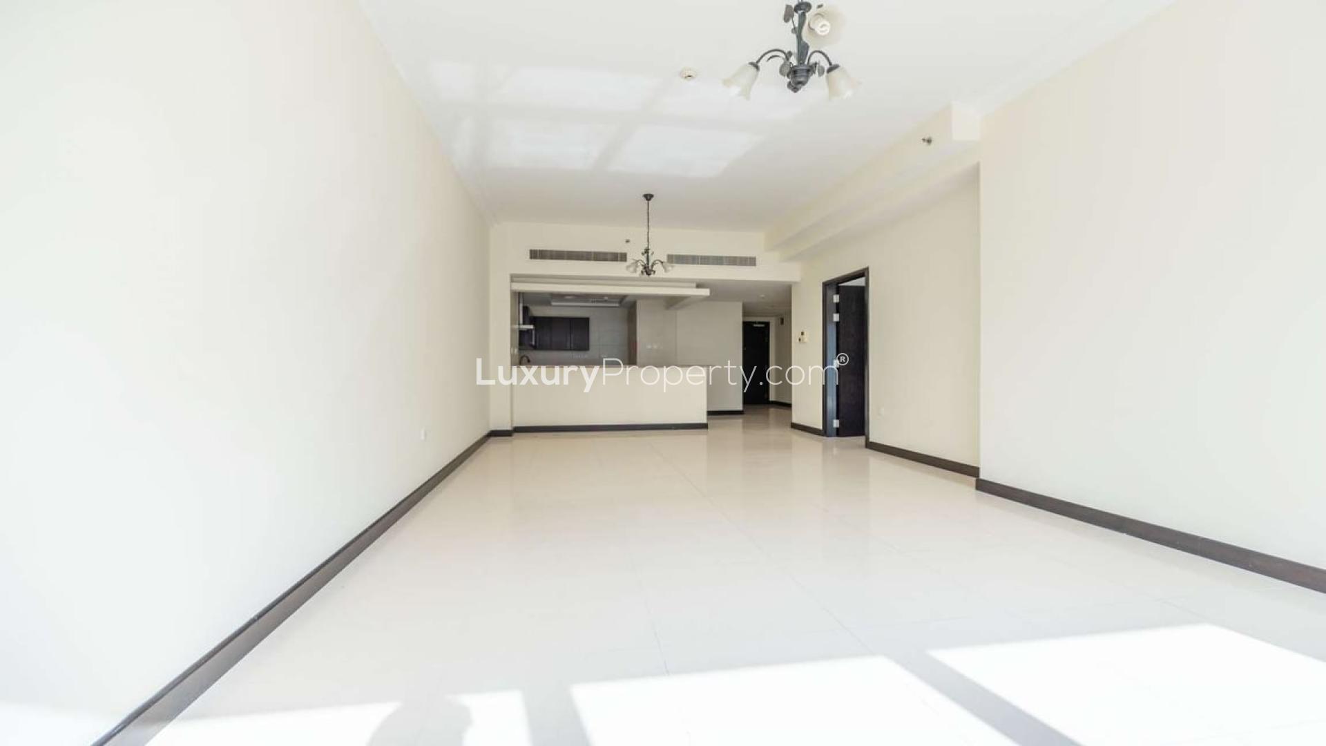 Luxurious empty living room with large windows in O2 Residence, JLT apartment for rent