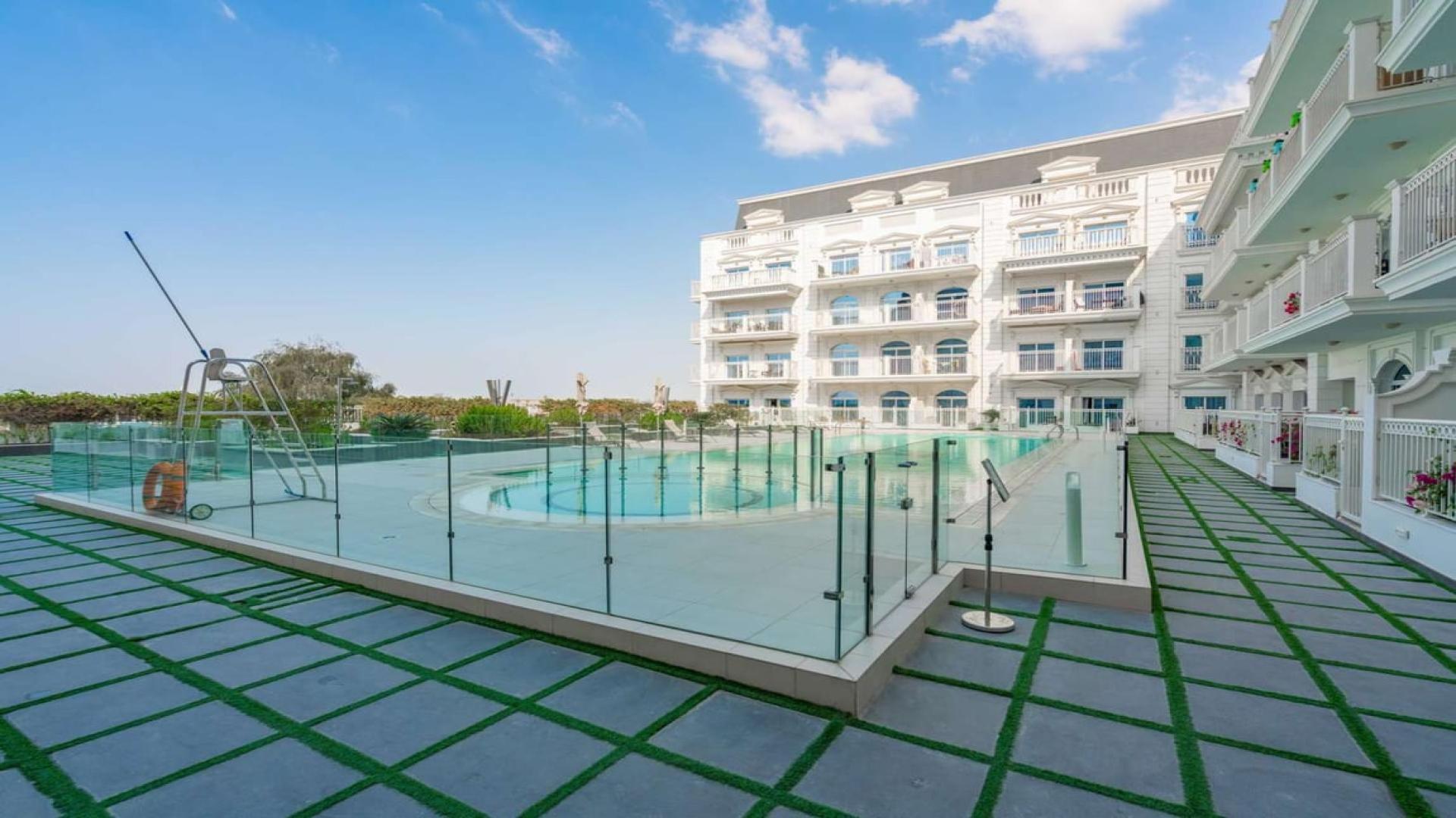 Front view of Vincitore Palacio apartment building in Arjan, available for rent