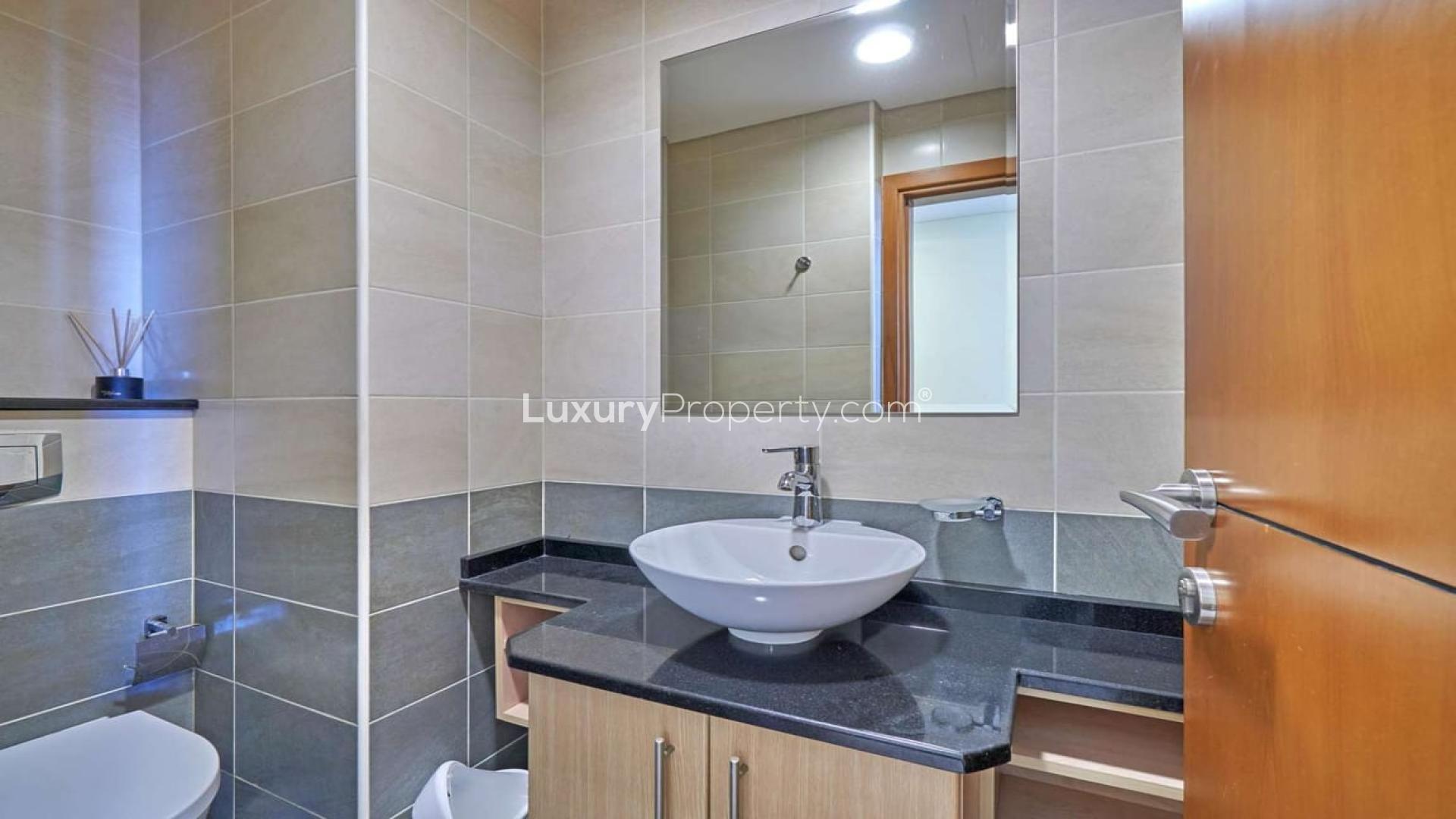 Modern bathroom in fully furnished 1-bedroom apartment, Ocean Heights, Dubai Marina for rent