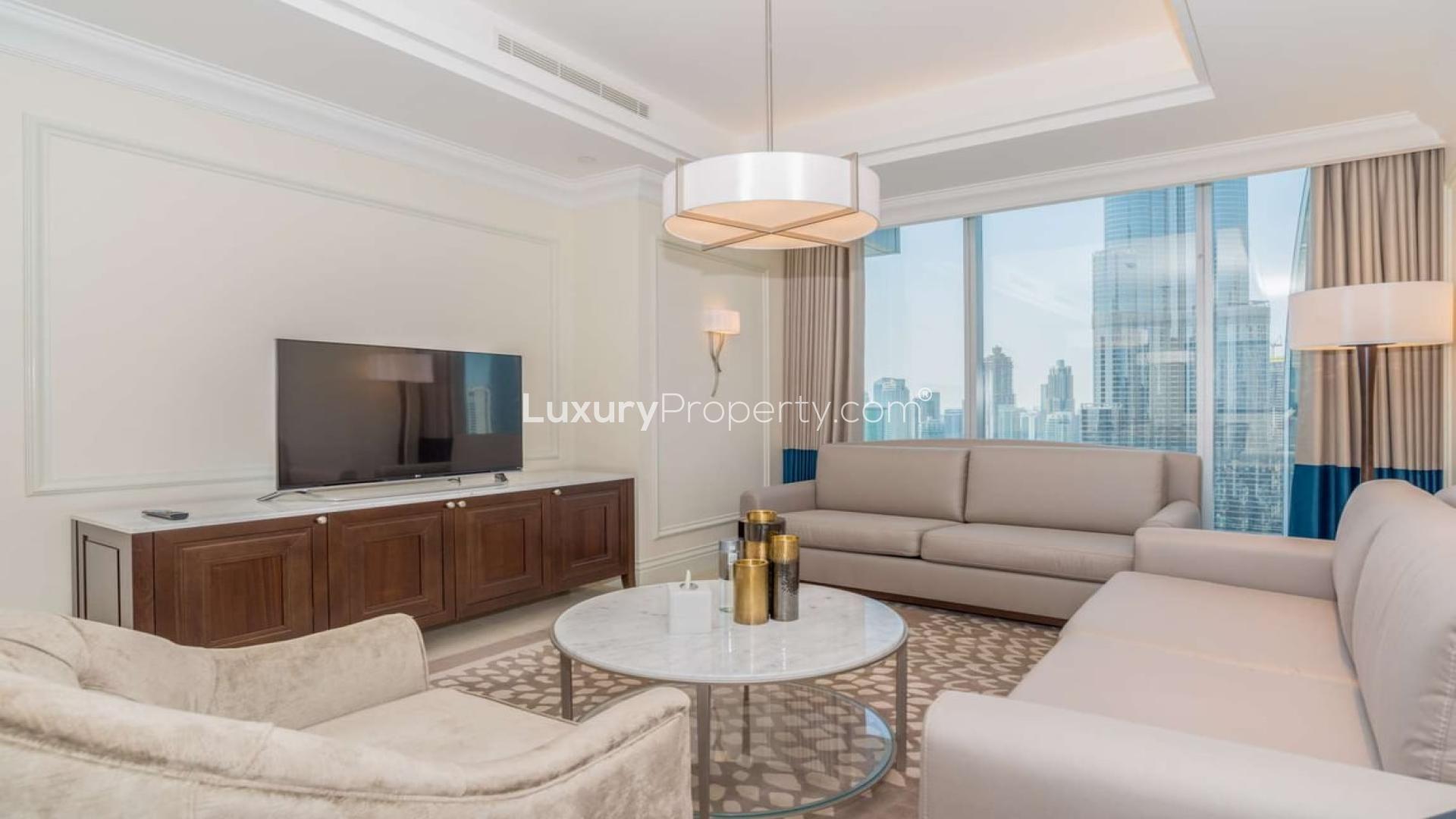 Balcony view from Address BLVD apartment overlooking Downtown Dubai skyline and Burj Khalifa