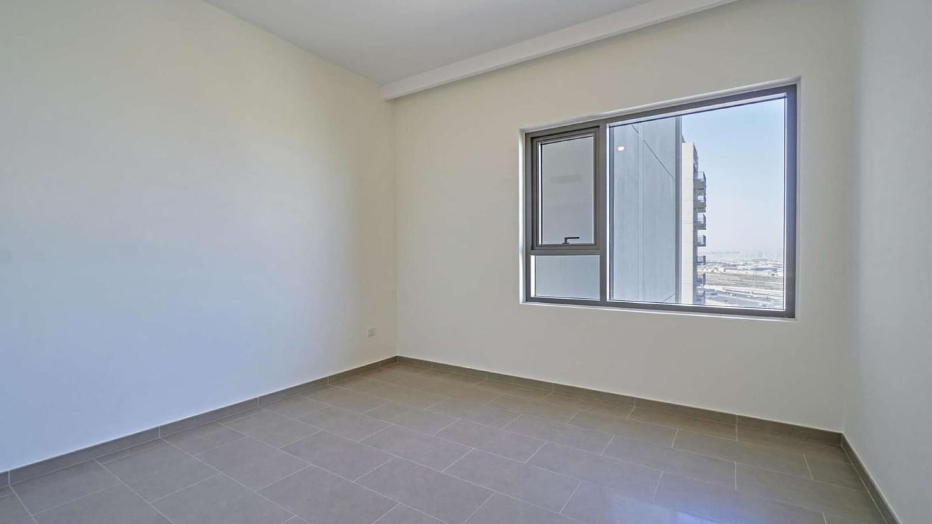 High-floor apartment view with pool, Dubai Hills Estate, Park Heights, Burj Al Arab visible