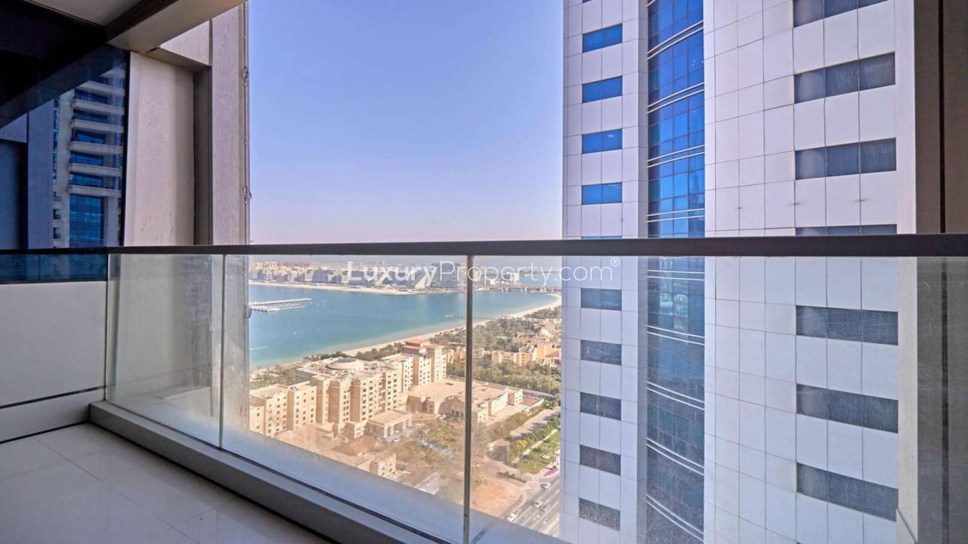 Modern living room in Ocean Heights 1-bedroom apartment, Dubai Marina, with large window view