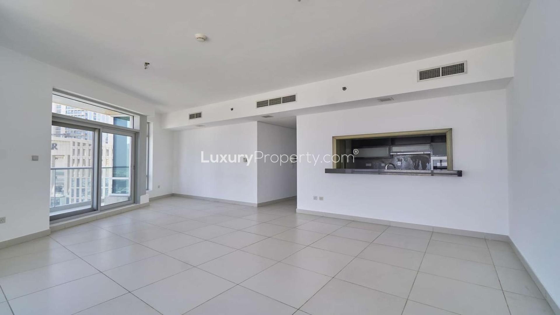 Balcony view from one-bedroom apartment in The Lofts, Downtown Dubai, featuring city skyline