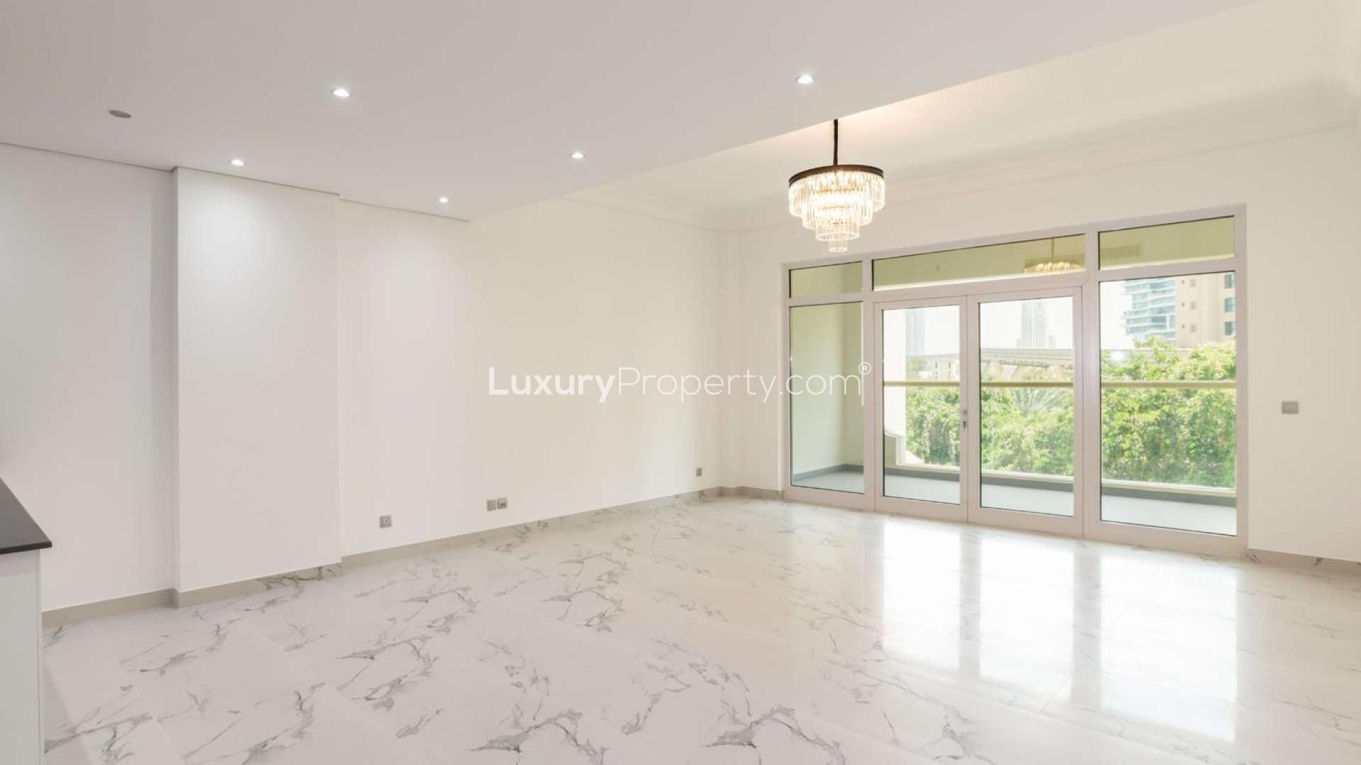 Bright living room in Shoreline, Palm Jumeirah one-bedroom apartment with marble flooring