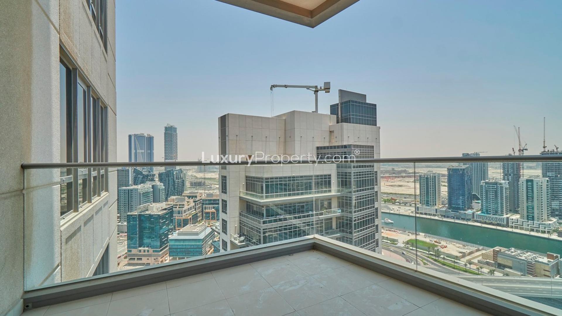 Empty living room with large windows in South Ridge apartment, Downtown Dubai