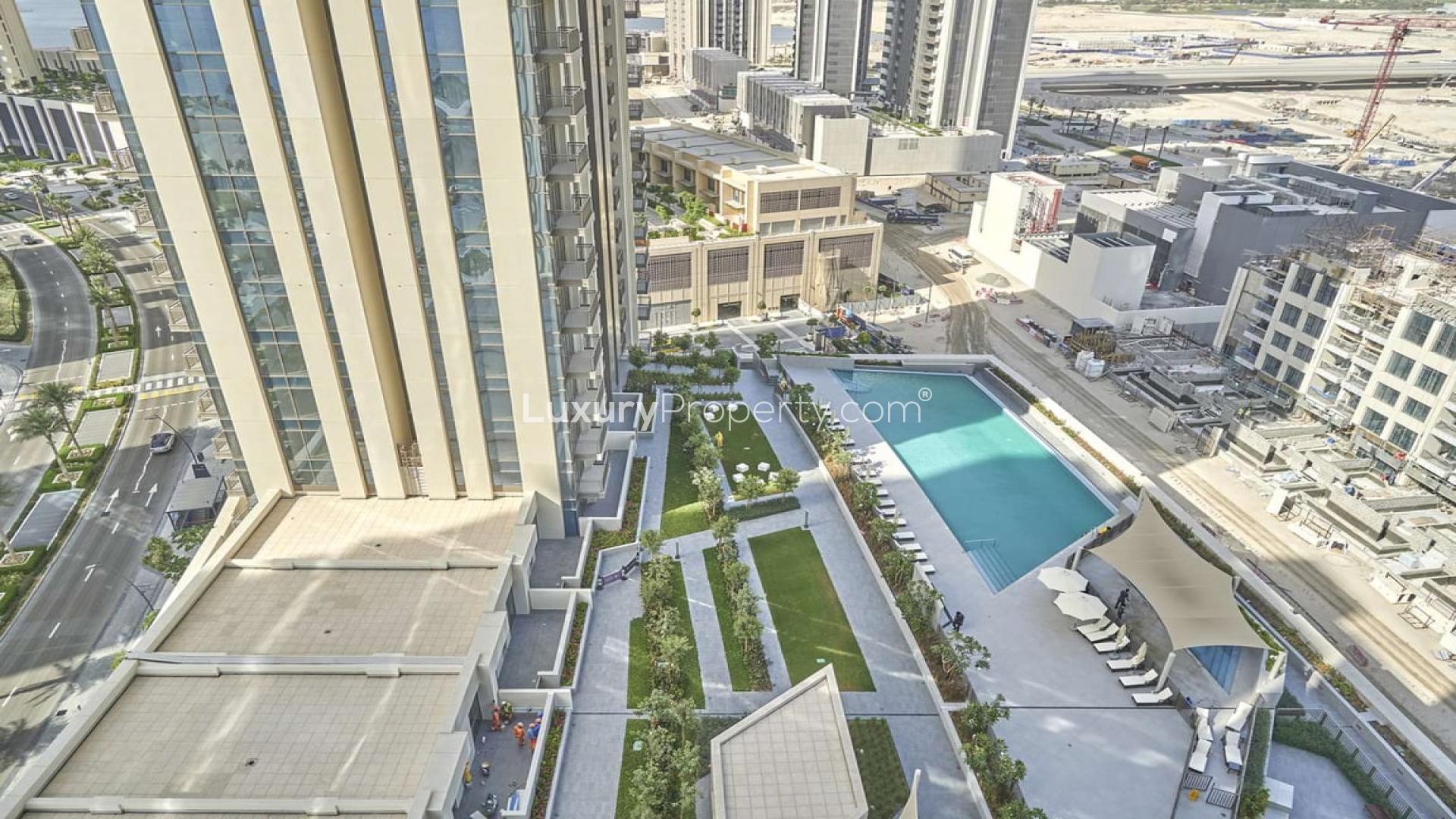 Rooftop pool with city views at Creekside 18, Dubai Creek Harbour apartment