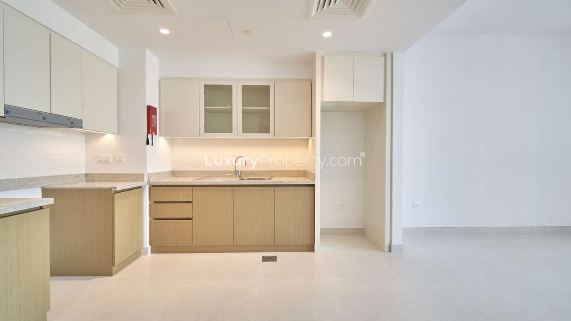 Elegant kitchen and living area in 1-bedroom apartment, Creekside 18, Dubai Creek Harbour