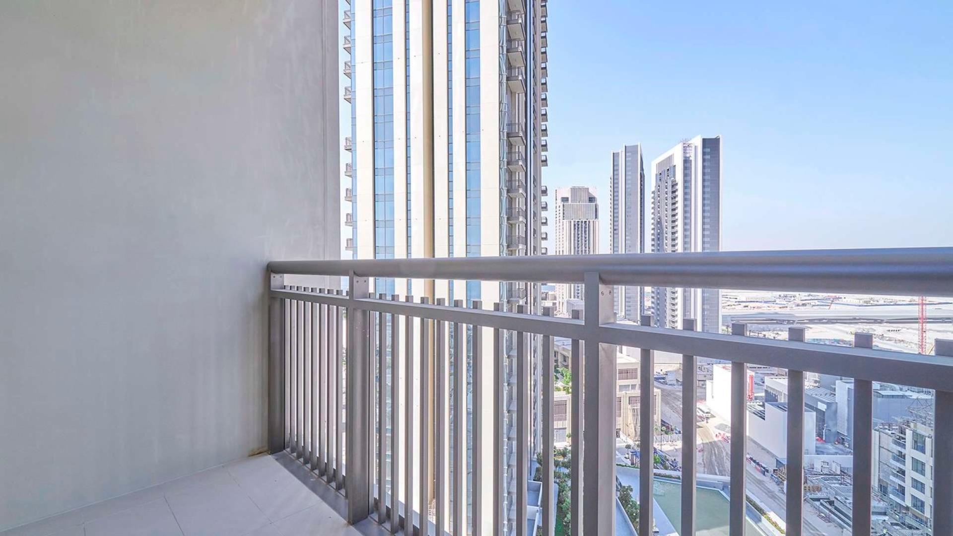 Aerial view of Creekside 18 apartment building and pool, Dubai Creek Harbour
