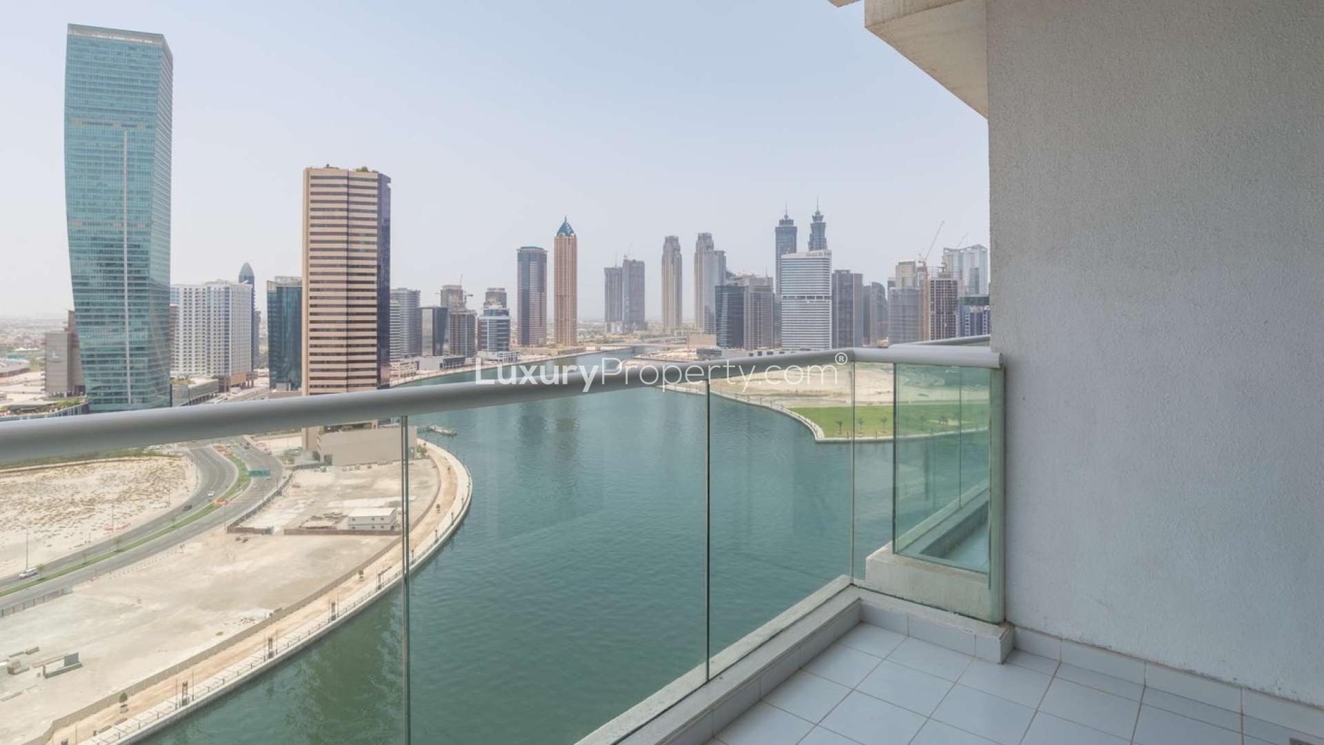 Balcony view from 1-bedroom apartment in Damac Maison Prive, Business Bay, overlooking canal