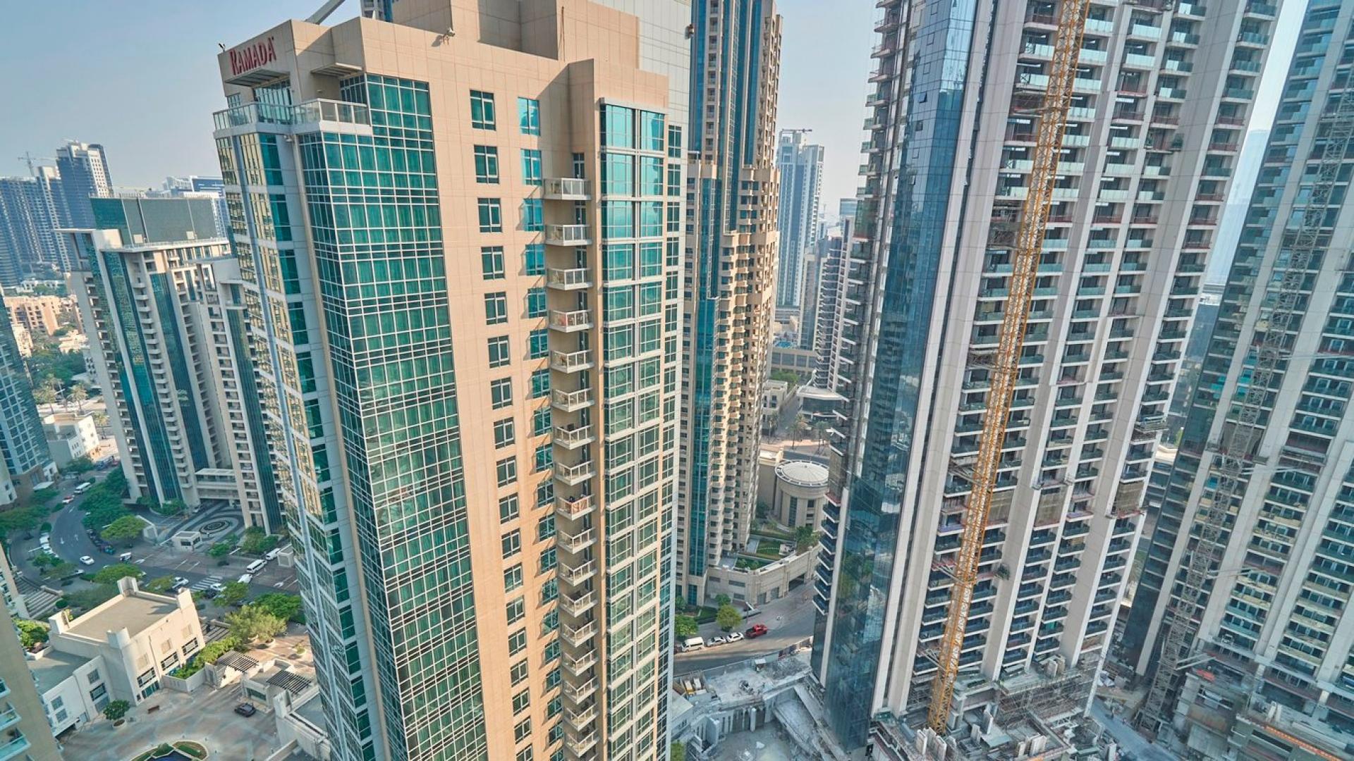 Balcony view from 1-bedroom apartment in Residences Tower 1, Downtown Dubai, overlooking skyscrapers