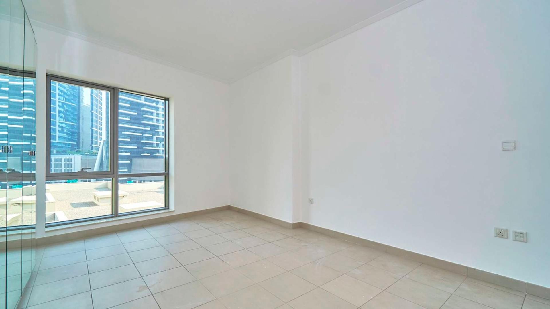 Spacious living room with large windows in South Ridge Tower 1, Downtown Dubai apartment